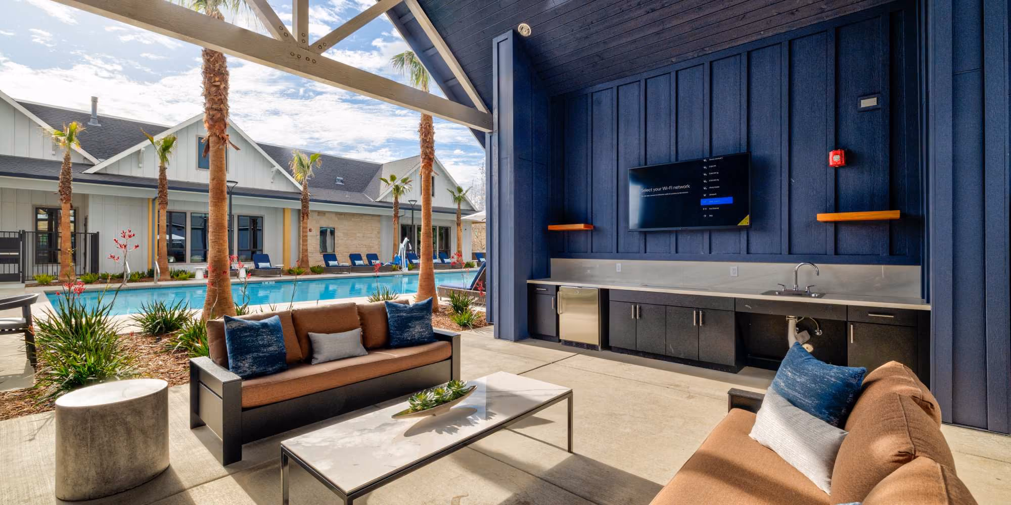 Outdoor lounge area under cabana