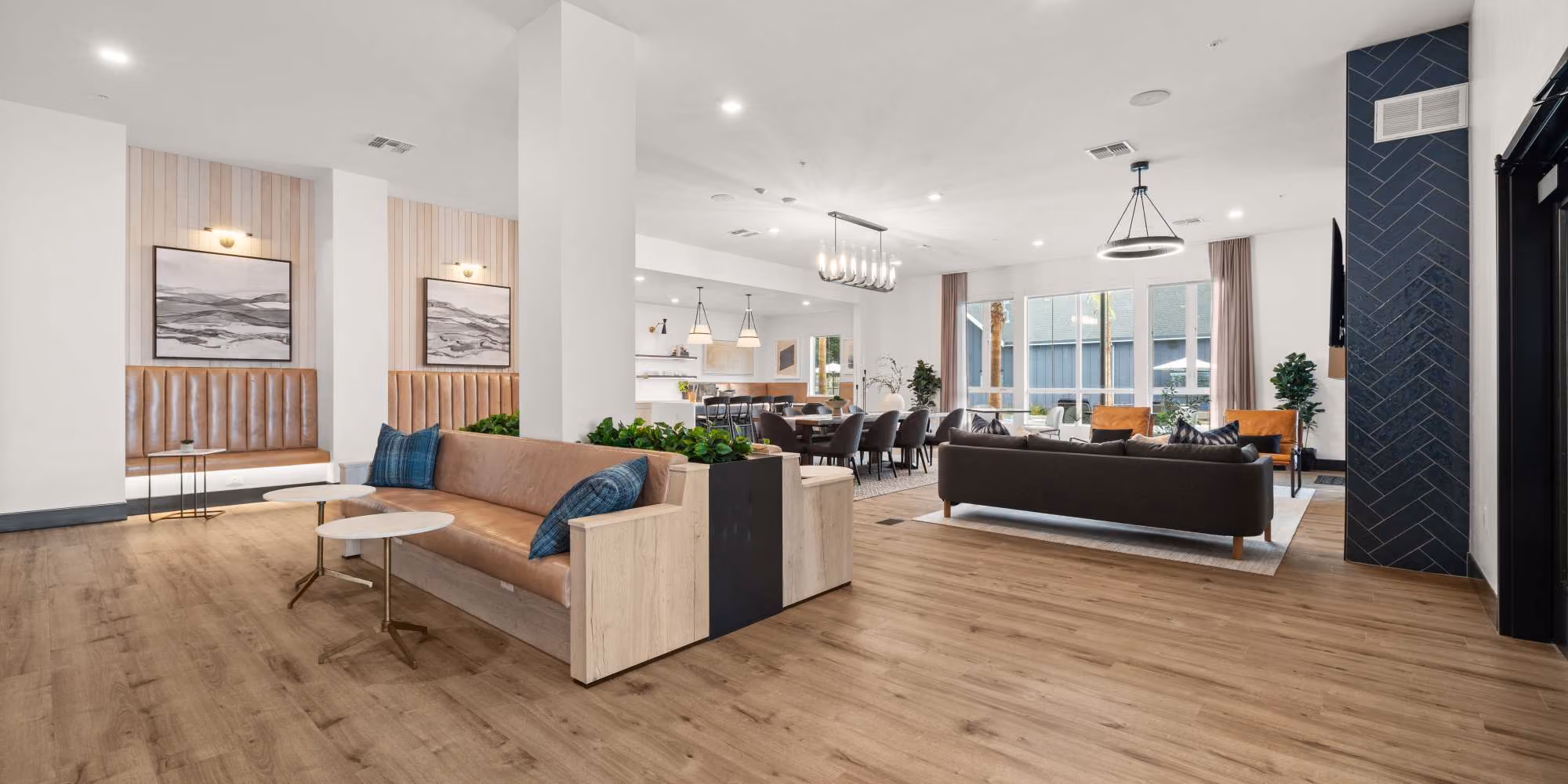 Community clubhouse seating area with sofas and tables