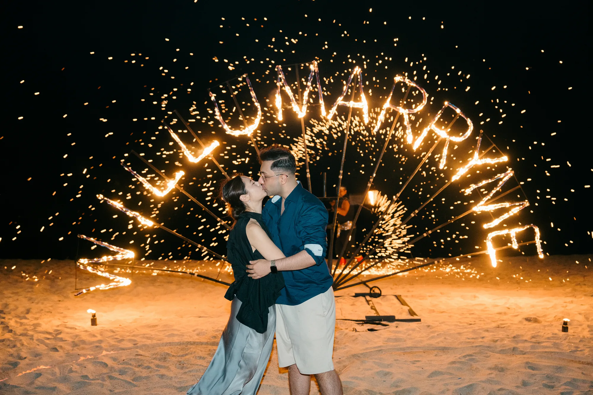 Marriage proposal with red rose heart on a Bali beach