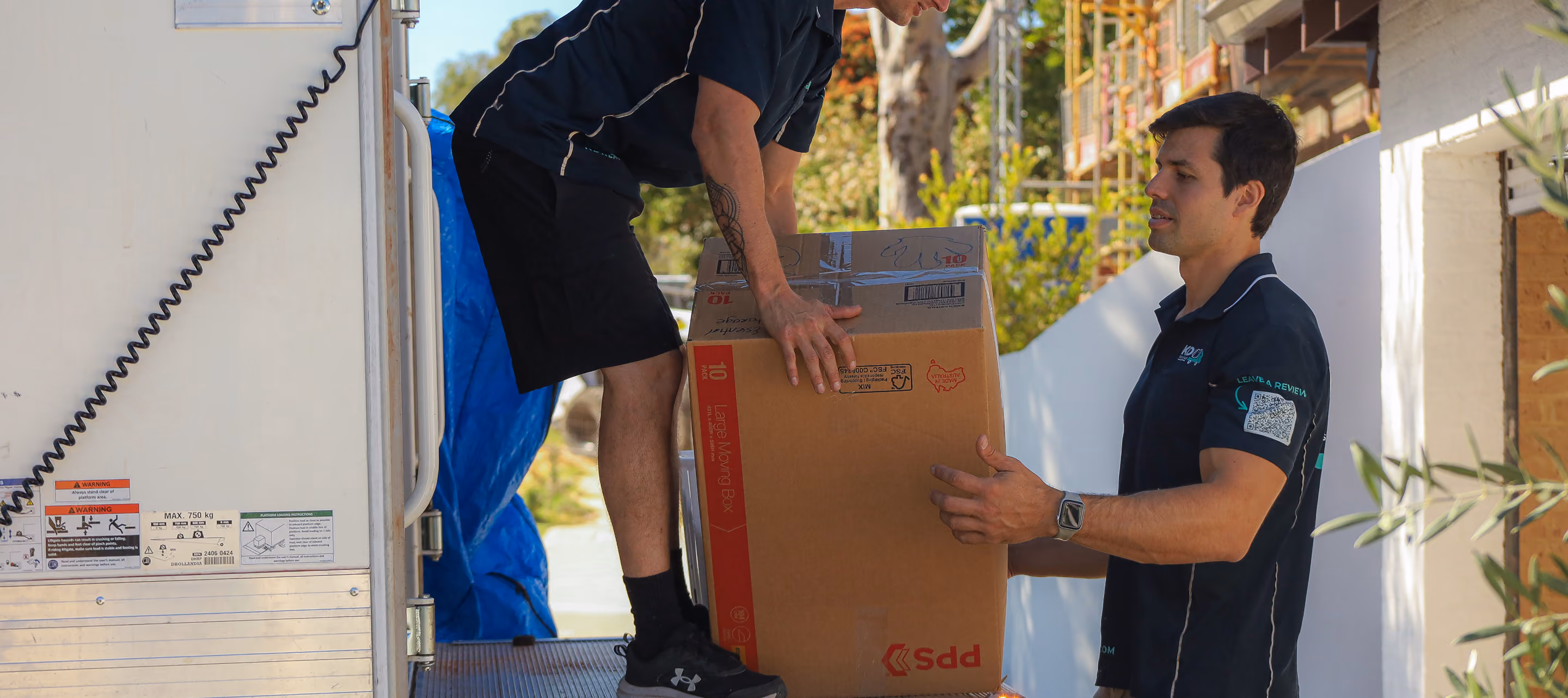 KD Removals crew loading a moving truck in Perth