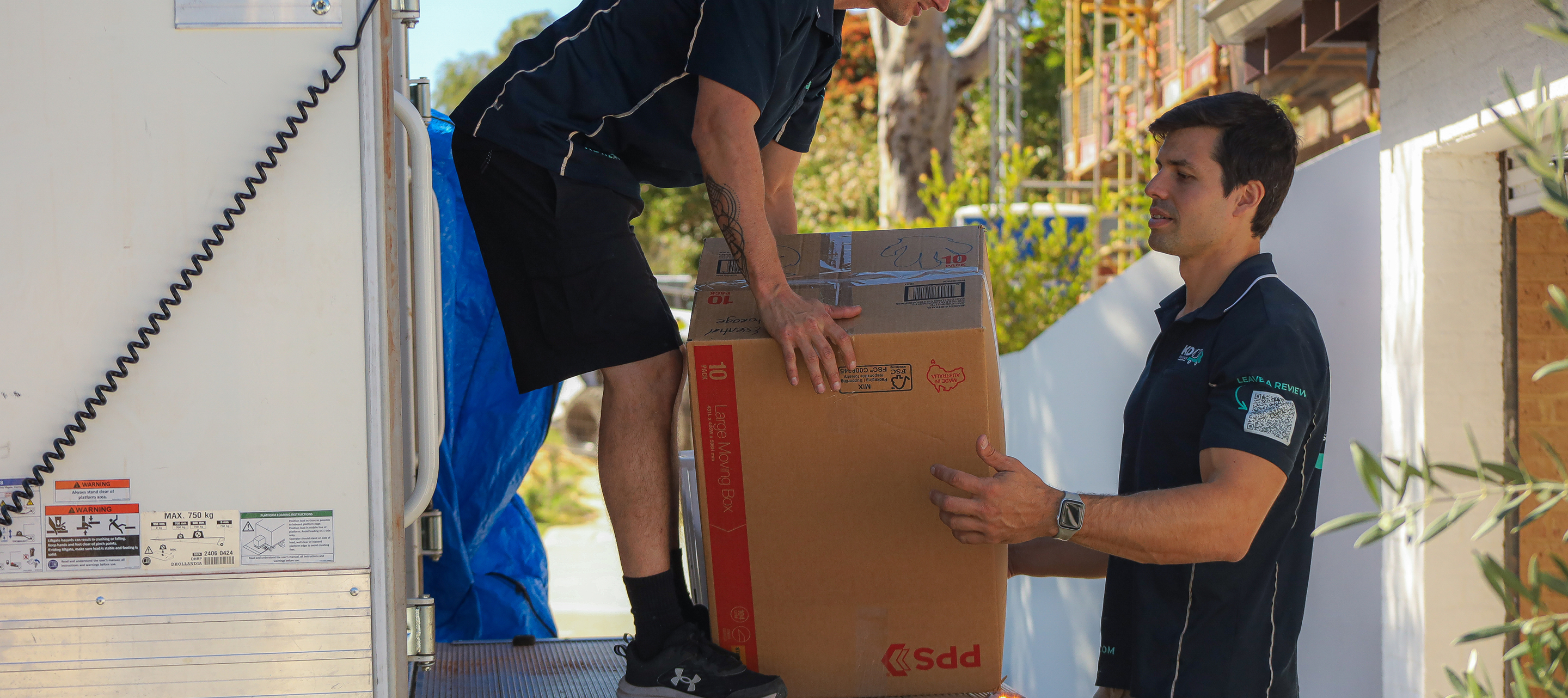 KD Removals crew loading a moving truck in Perth