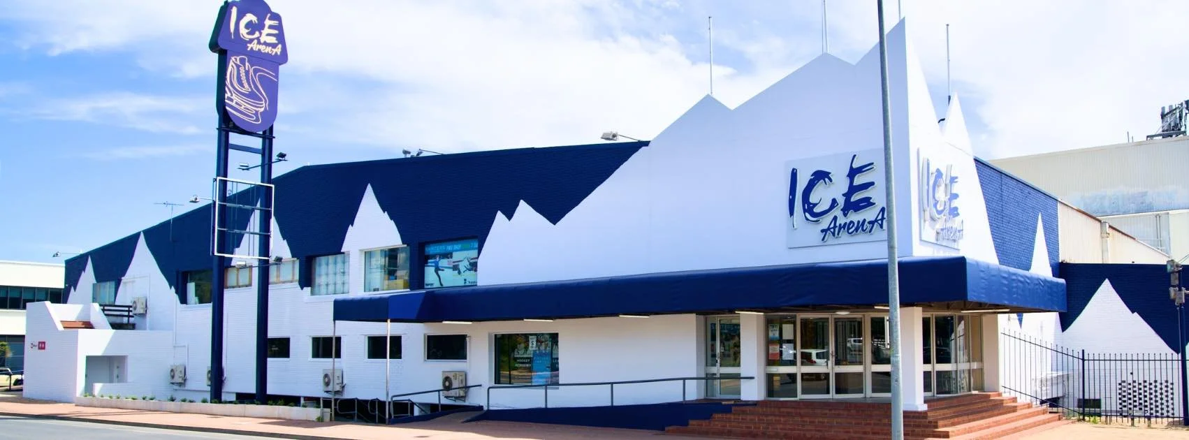 Refreshed exterior of Ice Arena Adelaide with updated branding and prominent roadside signage, signalling that the redeveloped venue was open, active and ready to welcome the community.