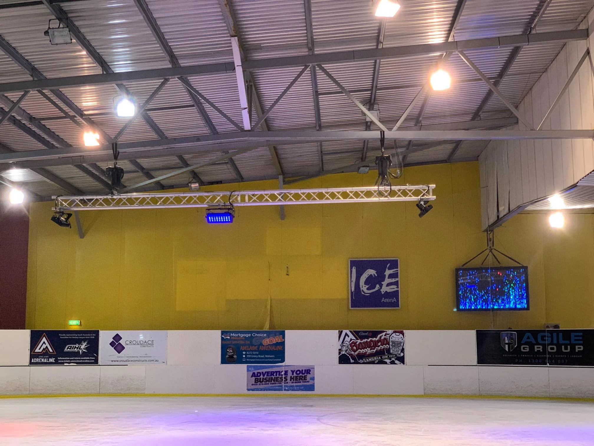 Upgraded rink interior at Ice Arena Adelaide with improved lighting, boards and digital displays, reflecting the practical facility changes that helped rebuild confidence in the venue.