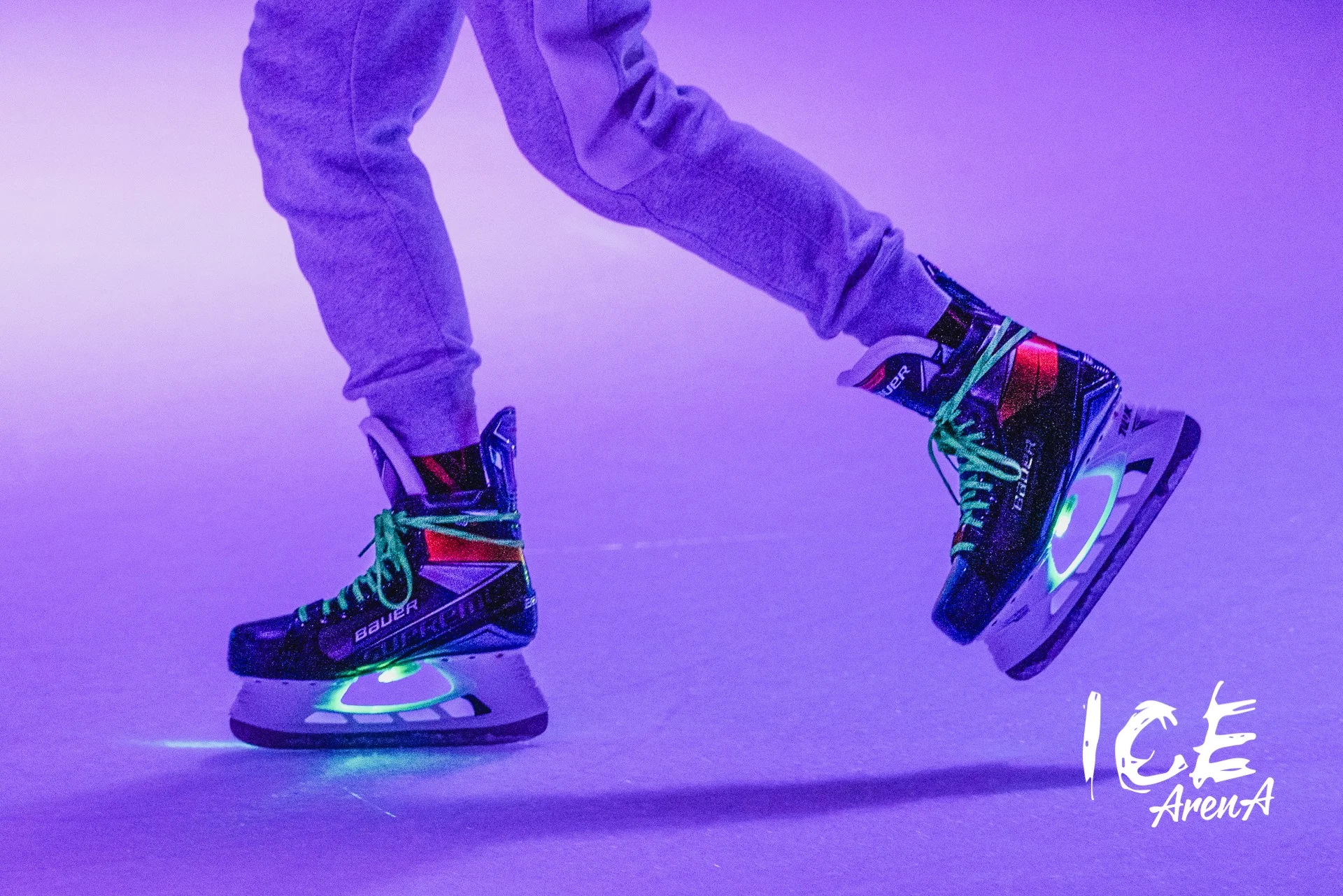 Close-up of illuminated ice hockey skates under purple lighting at Ice Arena Adelaide, reflecting the venue’s refreshed identity and more energetic visitor experience.