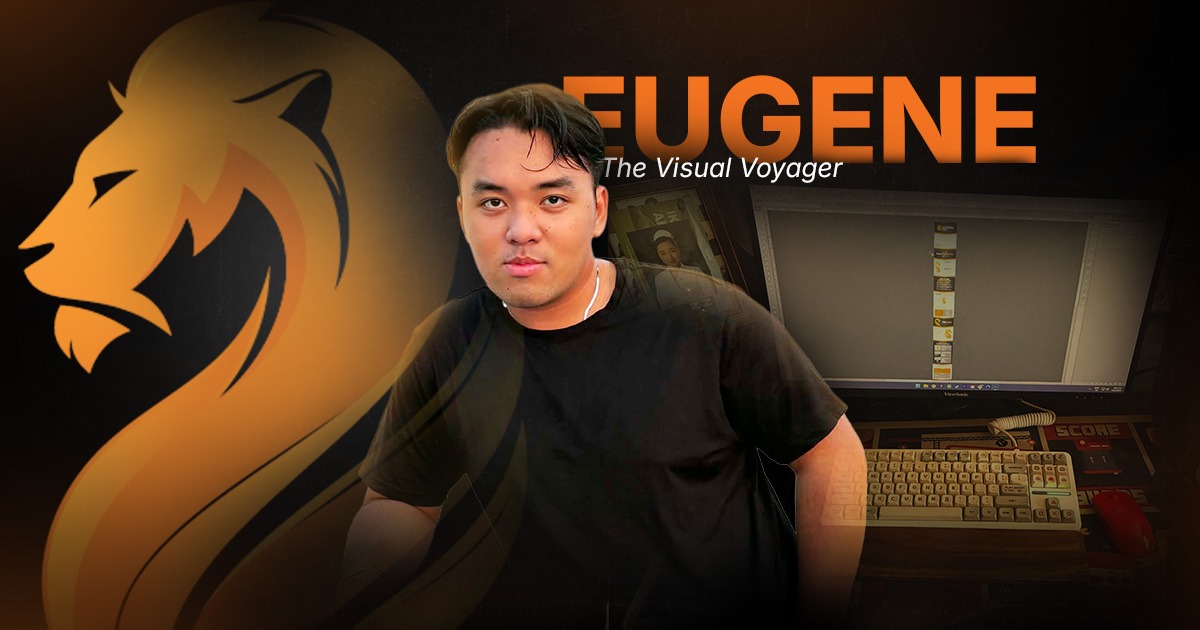 Eugene, Wandering Lion’s Visual Voyager, pictured beside his graphic design workspace and branded lion artwork.
