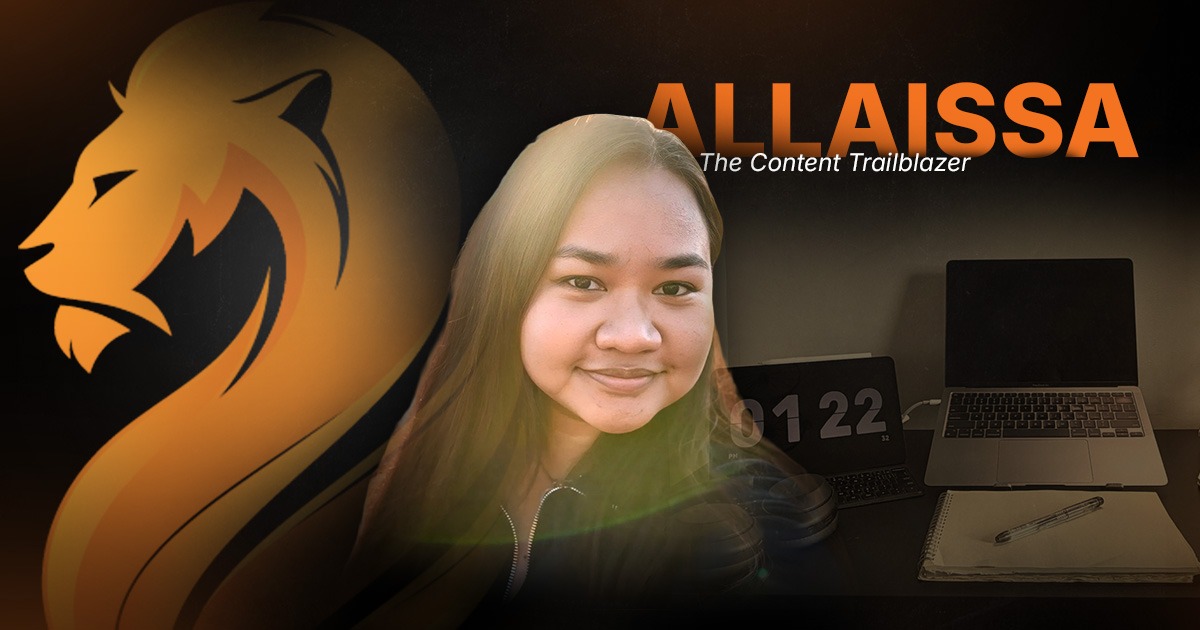 Allaisa, Wandering Lion’s Content Trailblazer, pictured with her remote workspace and branded lion graphic.