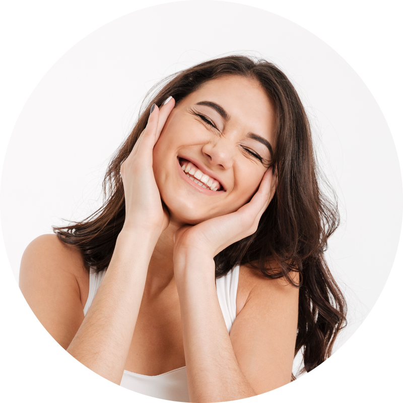 Smiling woman with her hands on her cheeks