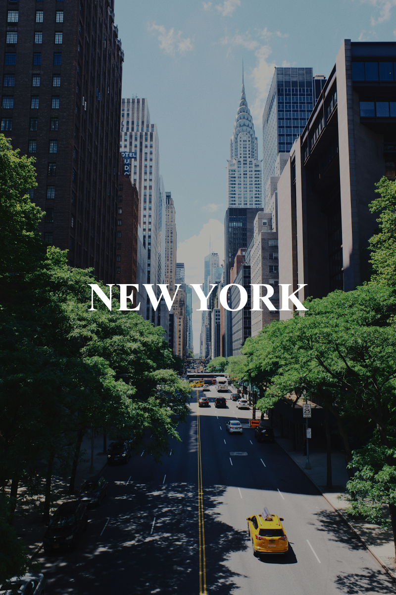 New York street with Empire State Building and a yellow cab 