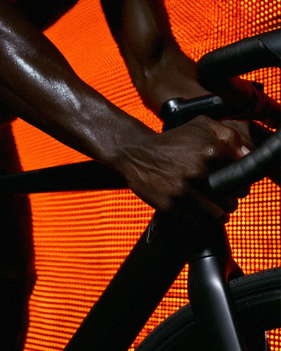 Cyclist riding with a determined expression