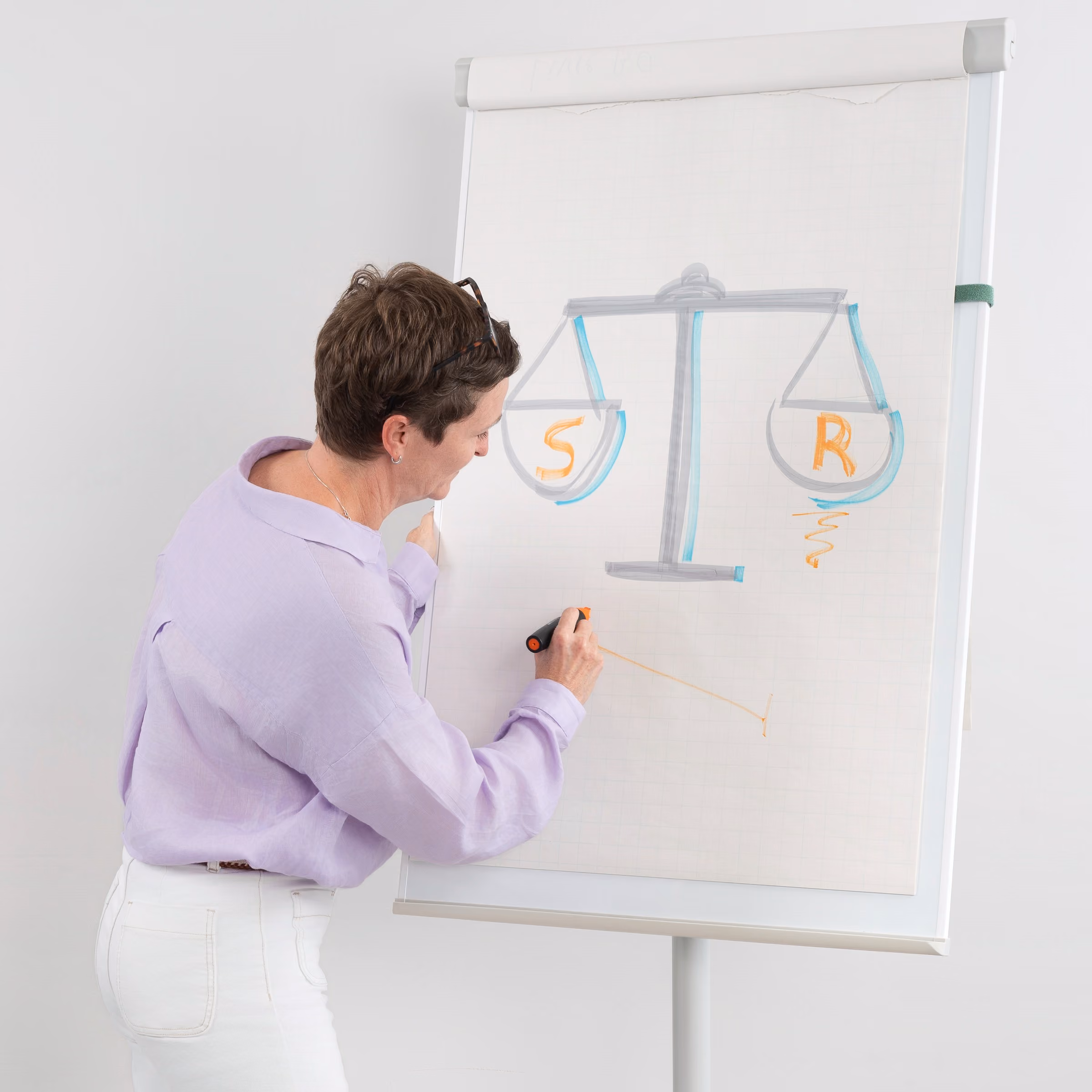Collage of people working, presenting, and meeting in an office environment with charts and documents.