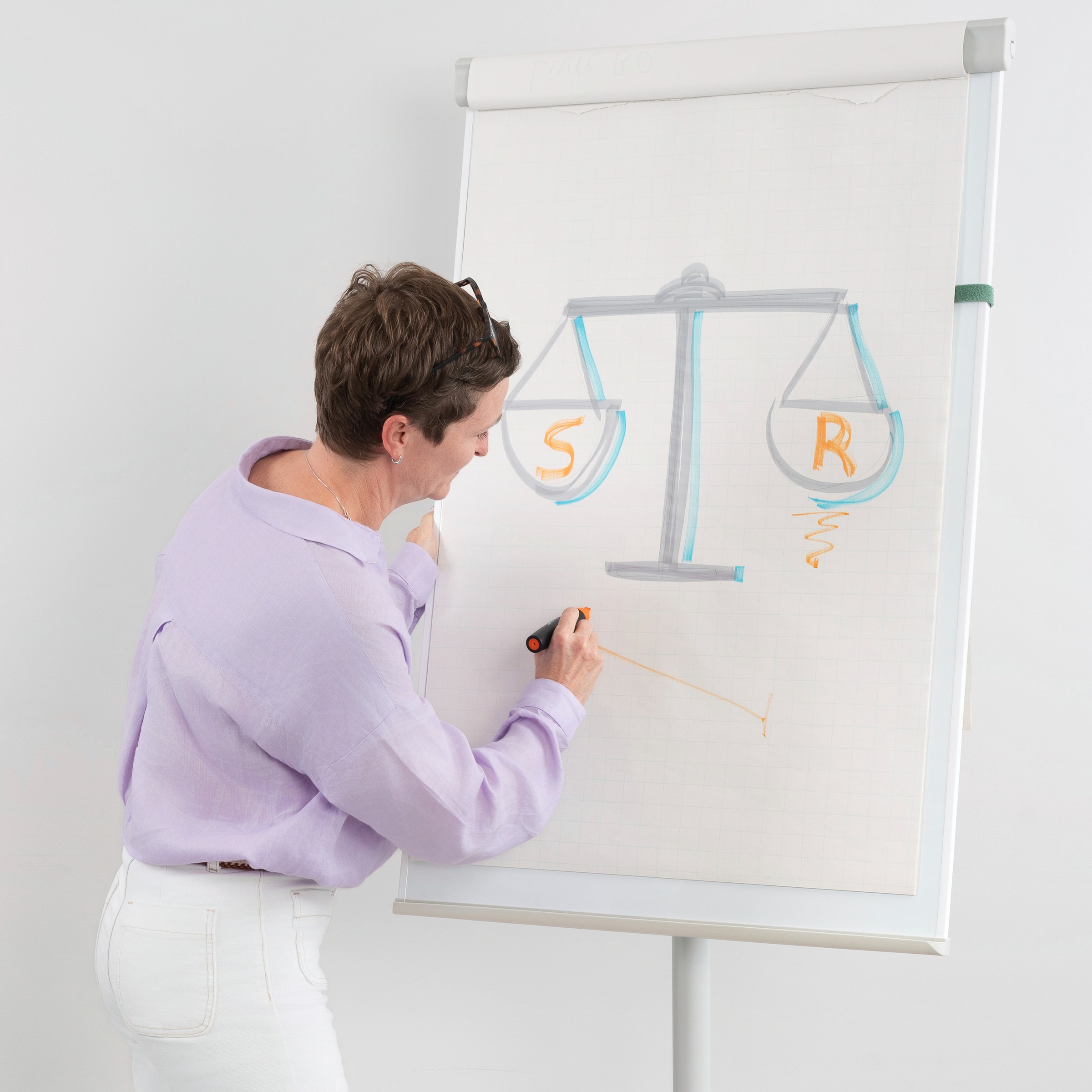 Collage of people working, presenting, and meeting in an office environment with charts and documents.