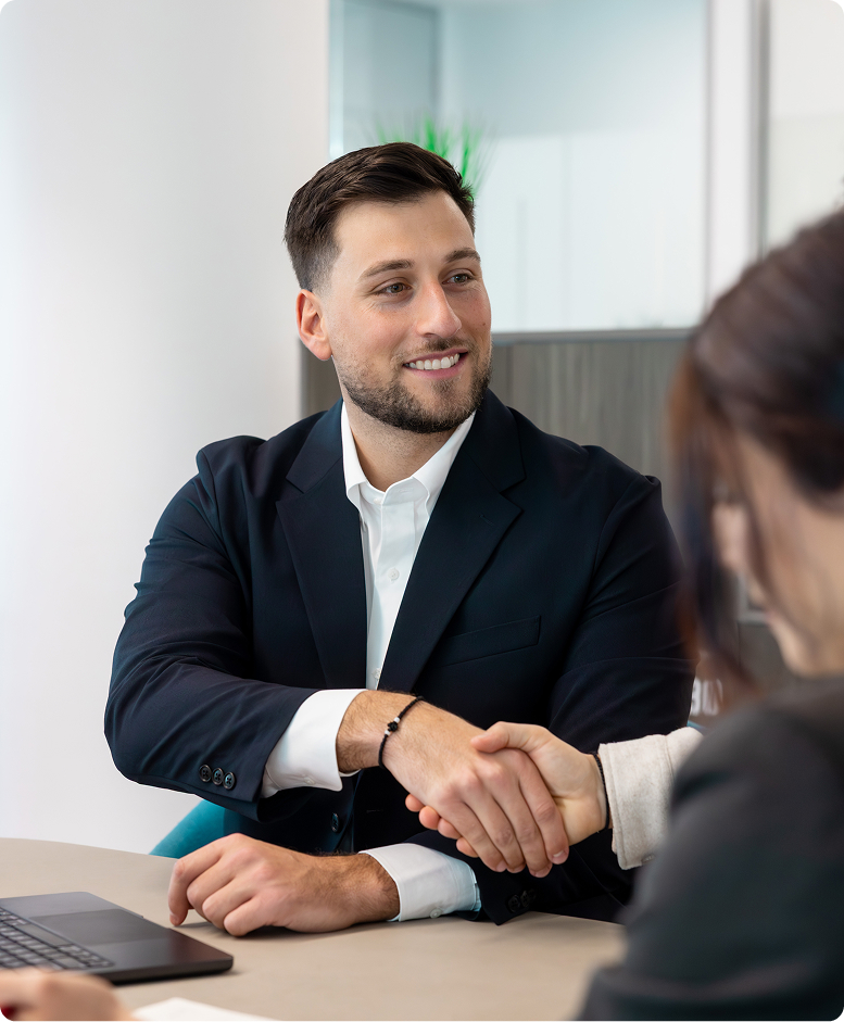 Initio Finance broker reviewing a refinancing strategy with a client