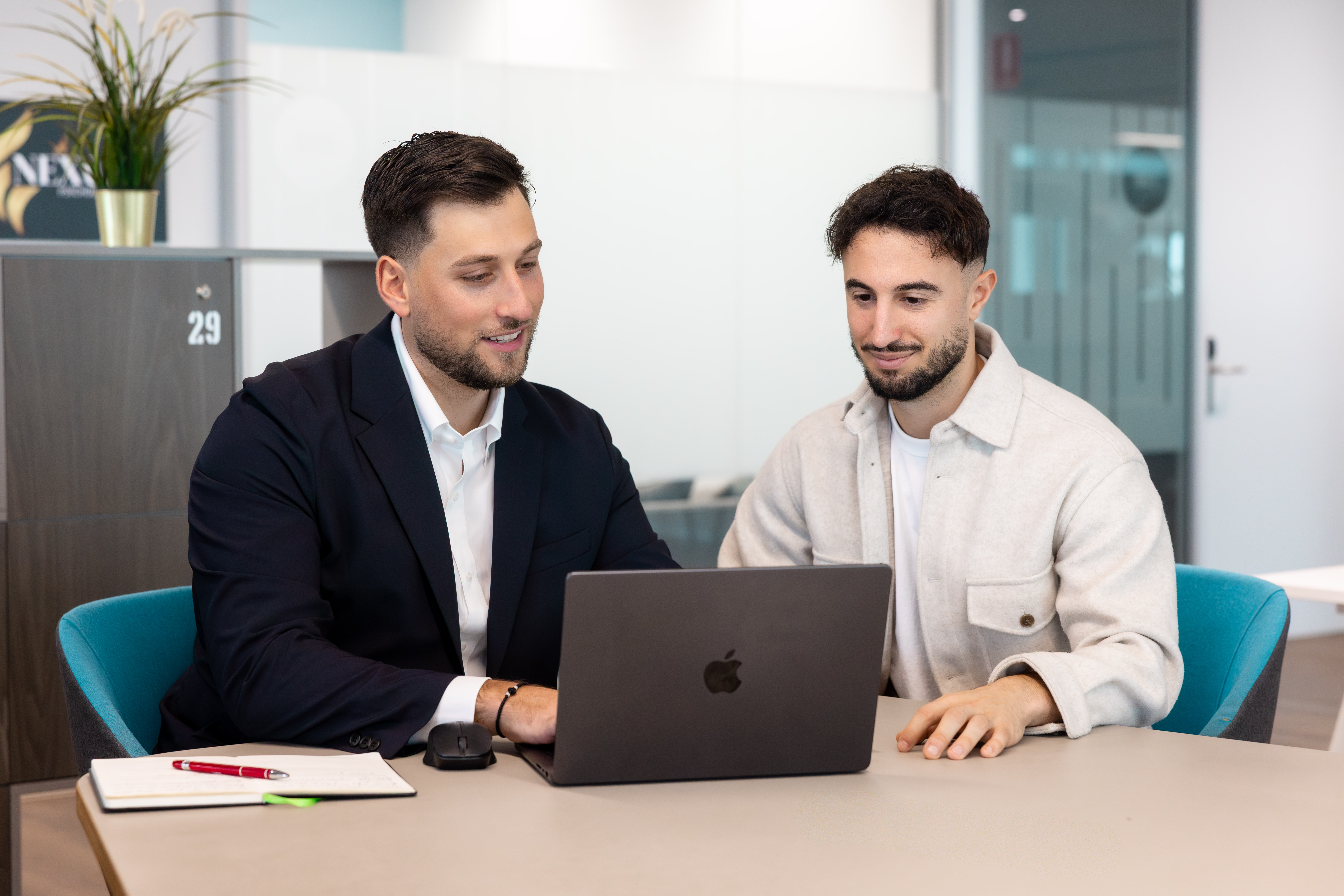 Initio Finance broker reviewing a debt consolidation strategy with a client