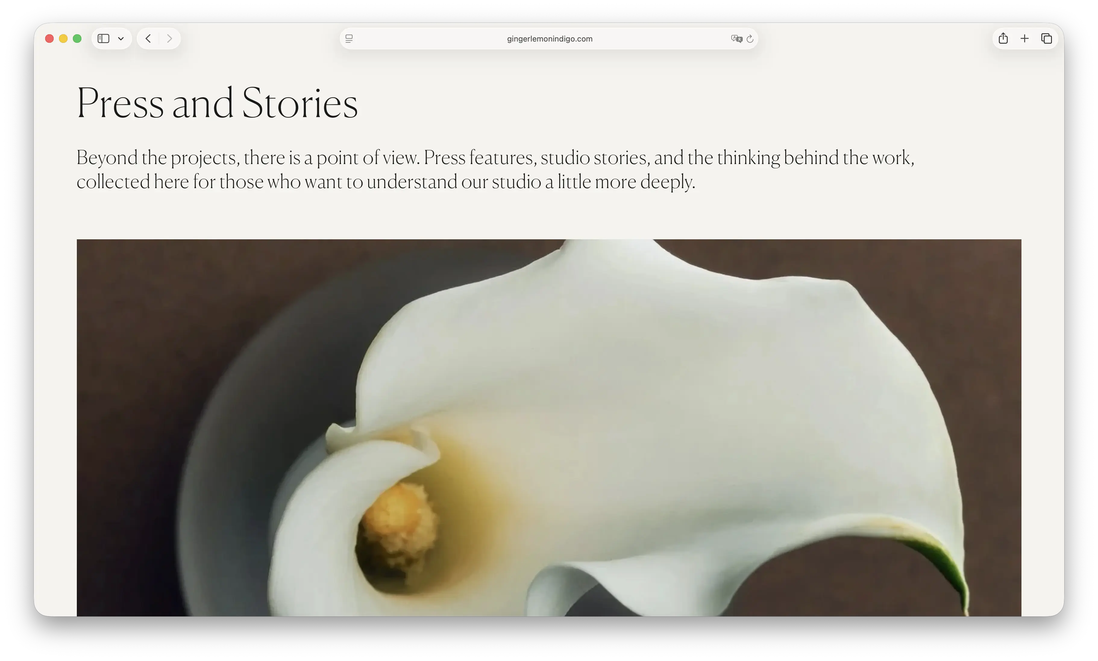 Screenshot of Ginger Lemon Indigo's Press and Stories page with a close-up calla lily photograph