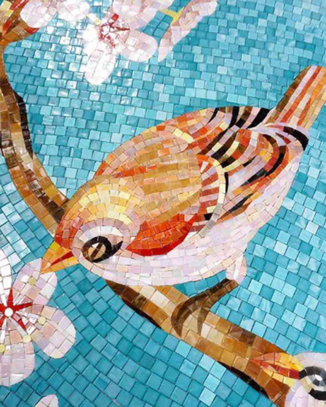 Colorful mosaic of a bird perched on a branch with white flowers on a blue background.