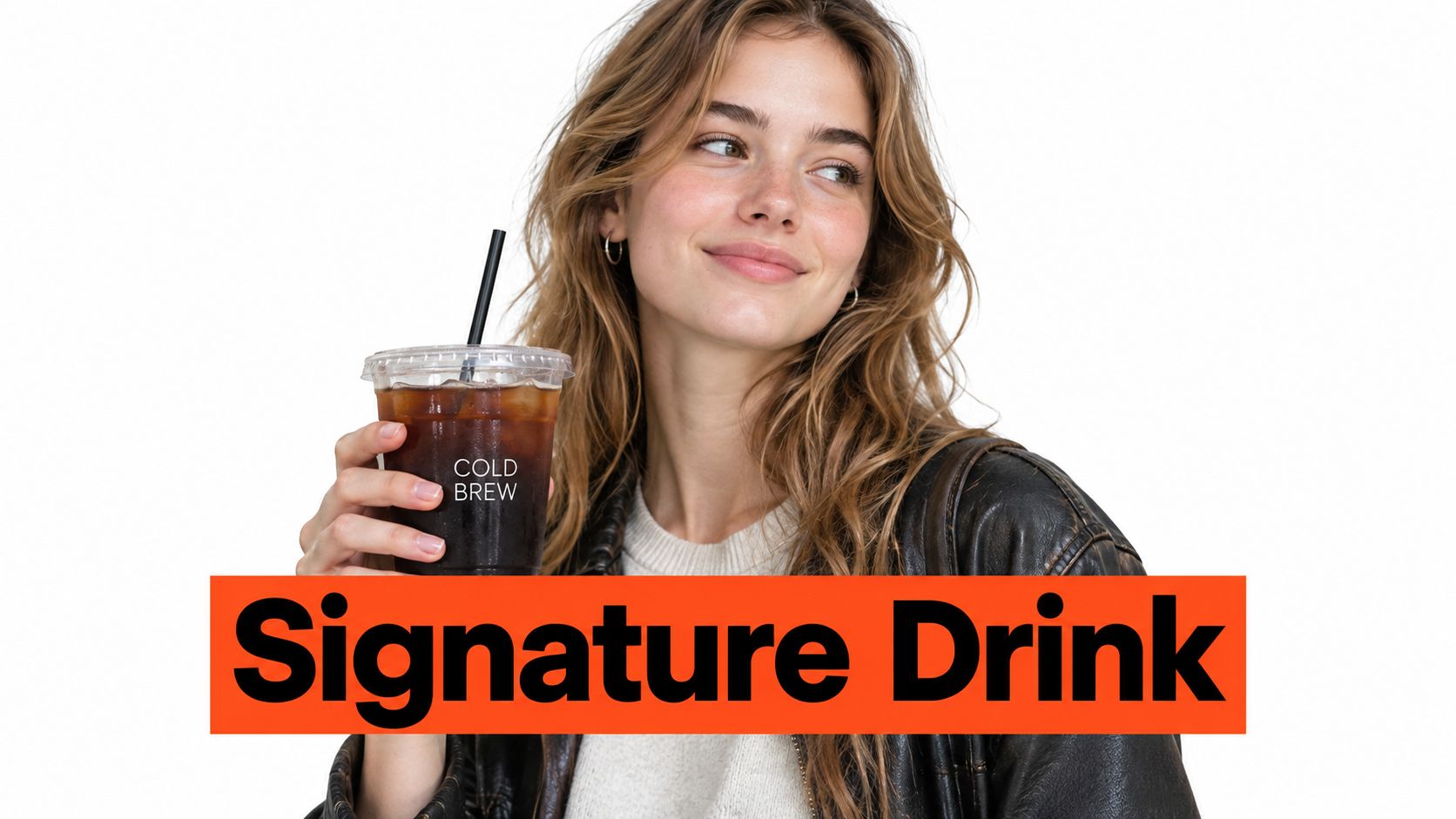 A young woman smiling while holding a clear plastic cup of cold brew coffee.