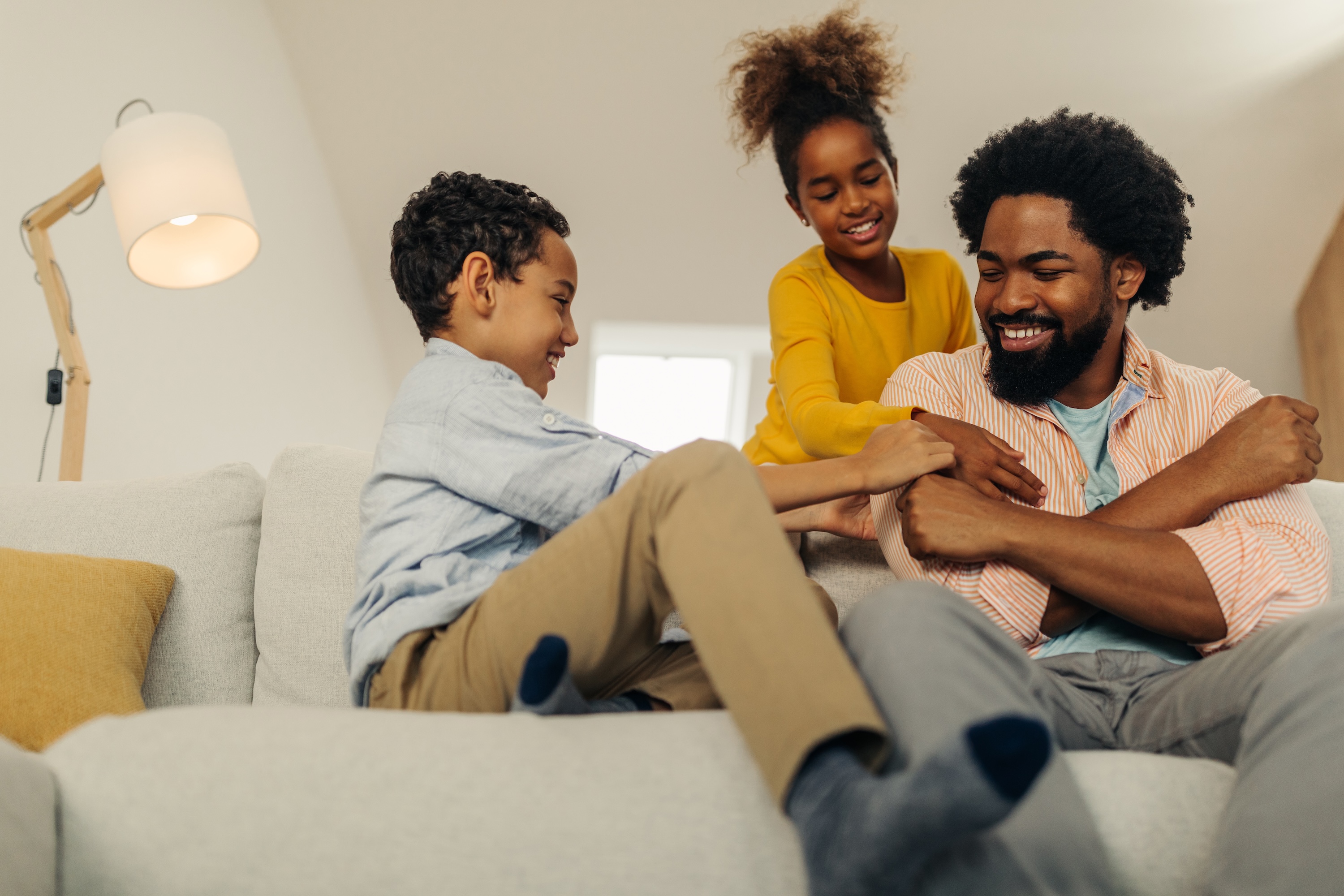 Family on couch stock image