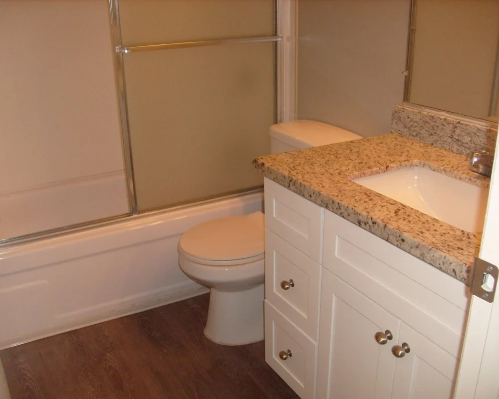 Bathroom with white cabinets
