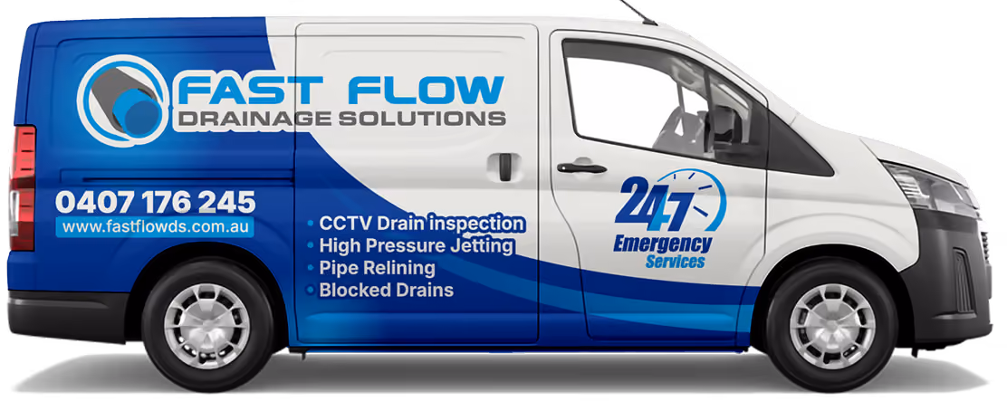 White and blue van with Fast Flow Drainage Solutions logo and listed drainage services and contact info.