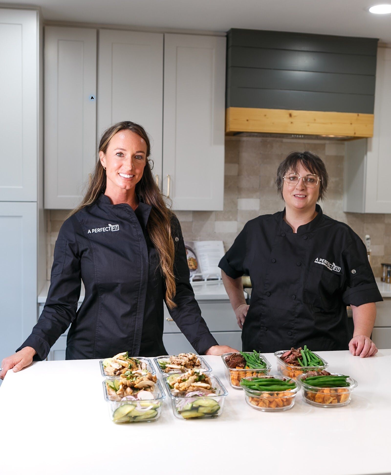 A Perfect Fit chefs in a residential kitchen with freshly prepared meals