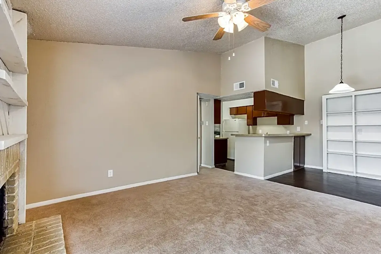 Santa Fe Apartments bedroom with warm plank flooring