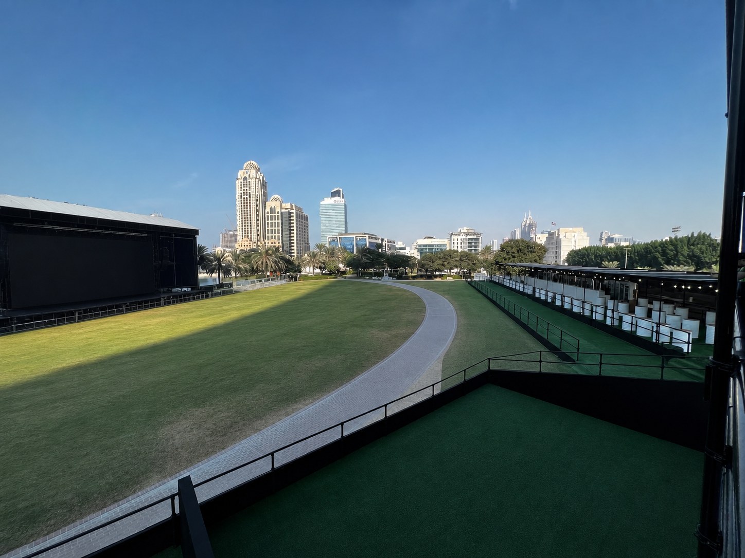 Empty main lawn at the FIFA Fan Festival site in Dubai before the Ray Events build