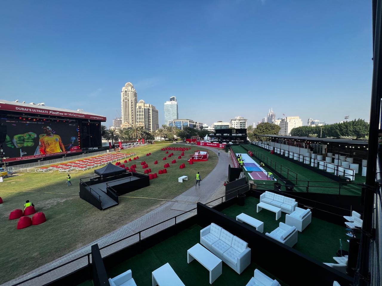 The same lawn dressed as a spectator field with lounge suites and beanbag clusters