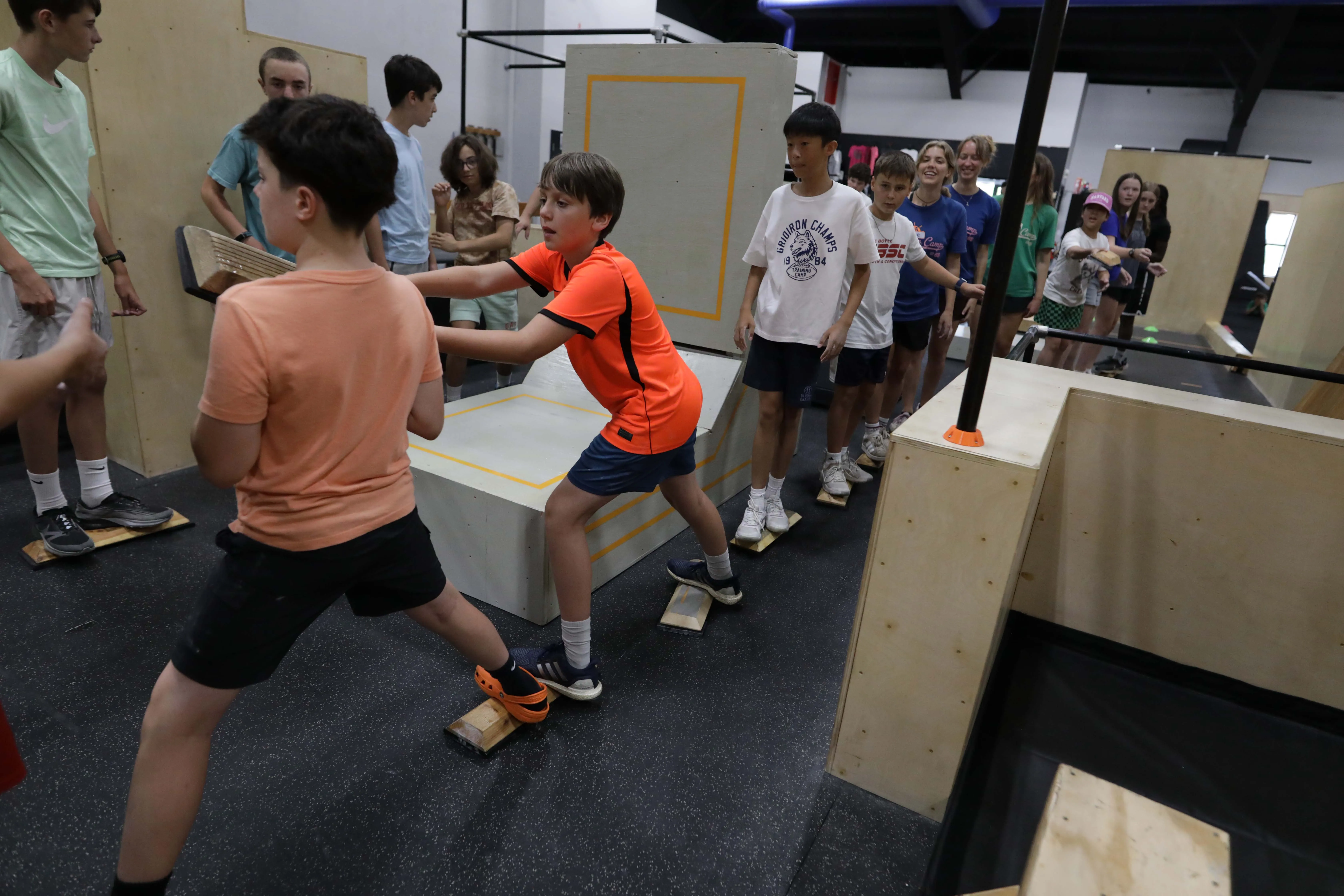 Kids and teens training together in a youth class at HUB Sudbury