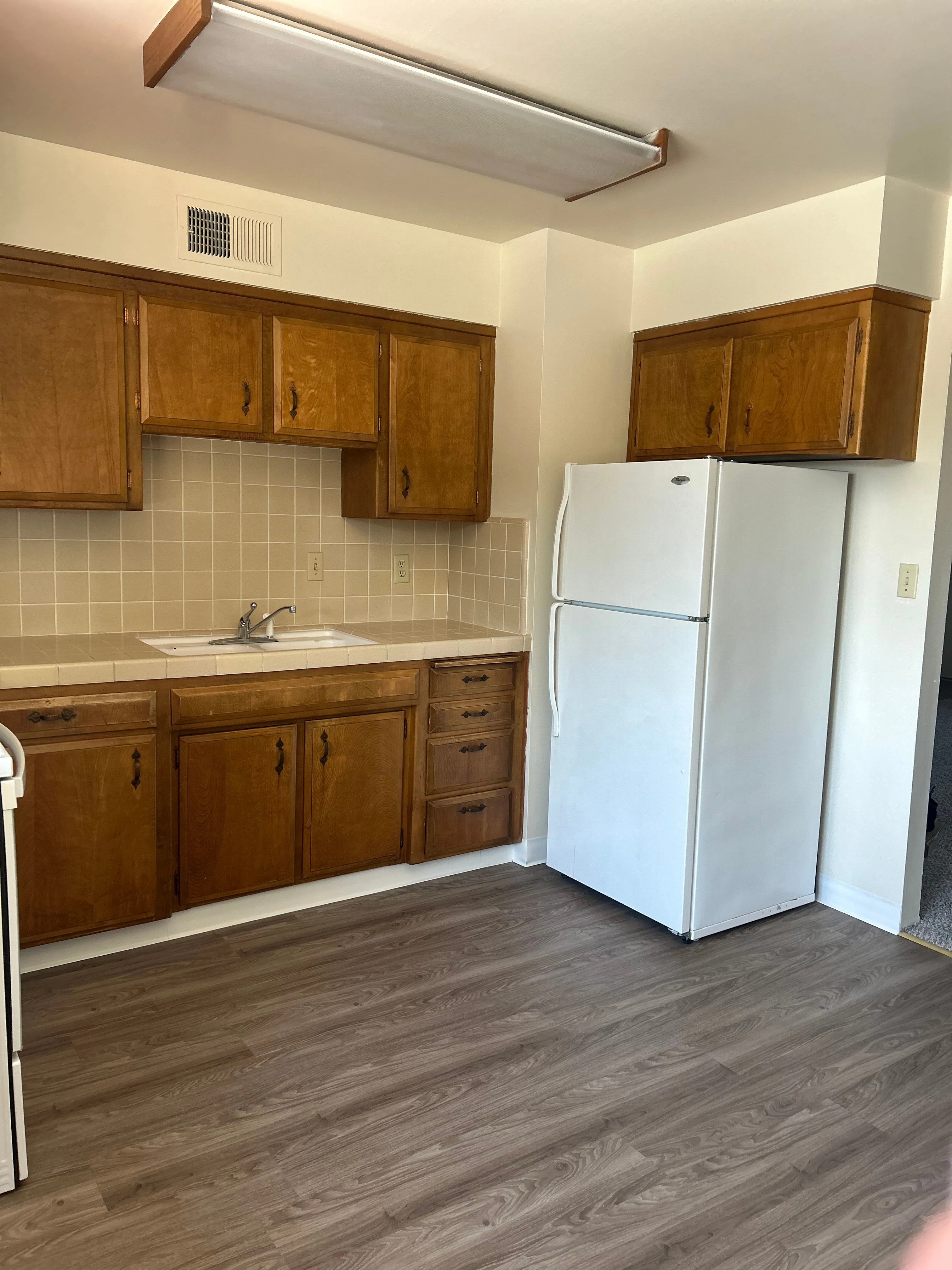 Kitchen with brown cabinets 