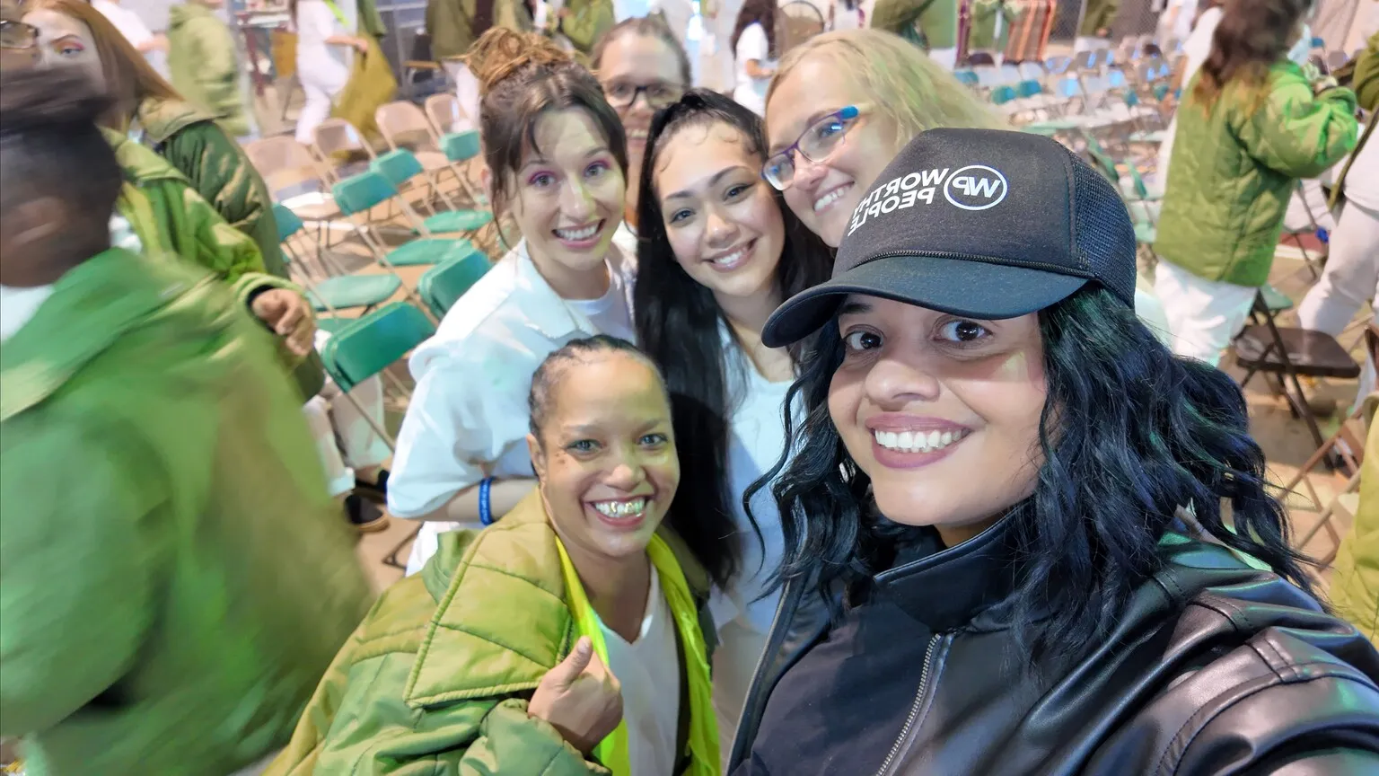Group of women taking a selfie at an event