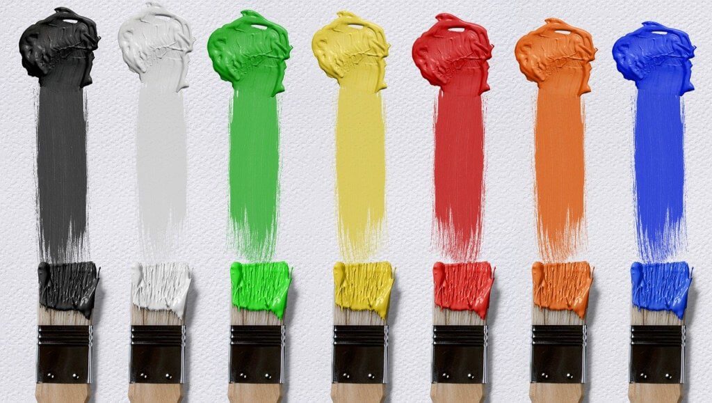 Paint brush colours representing website design changes