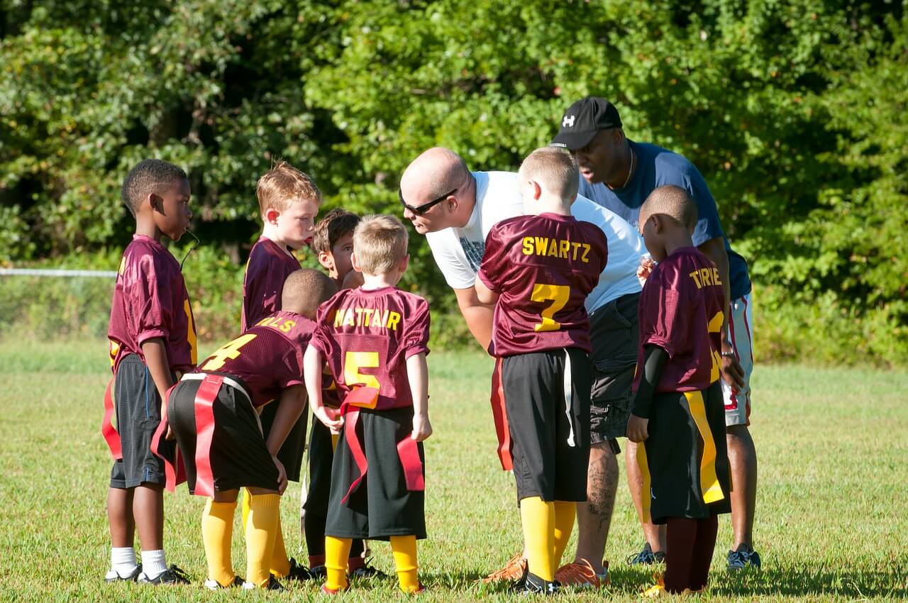 Coach pressuring athletes in youth sports