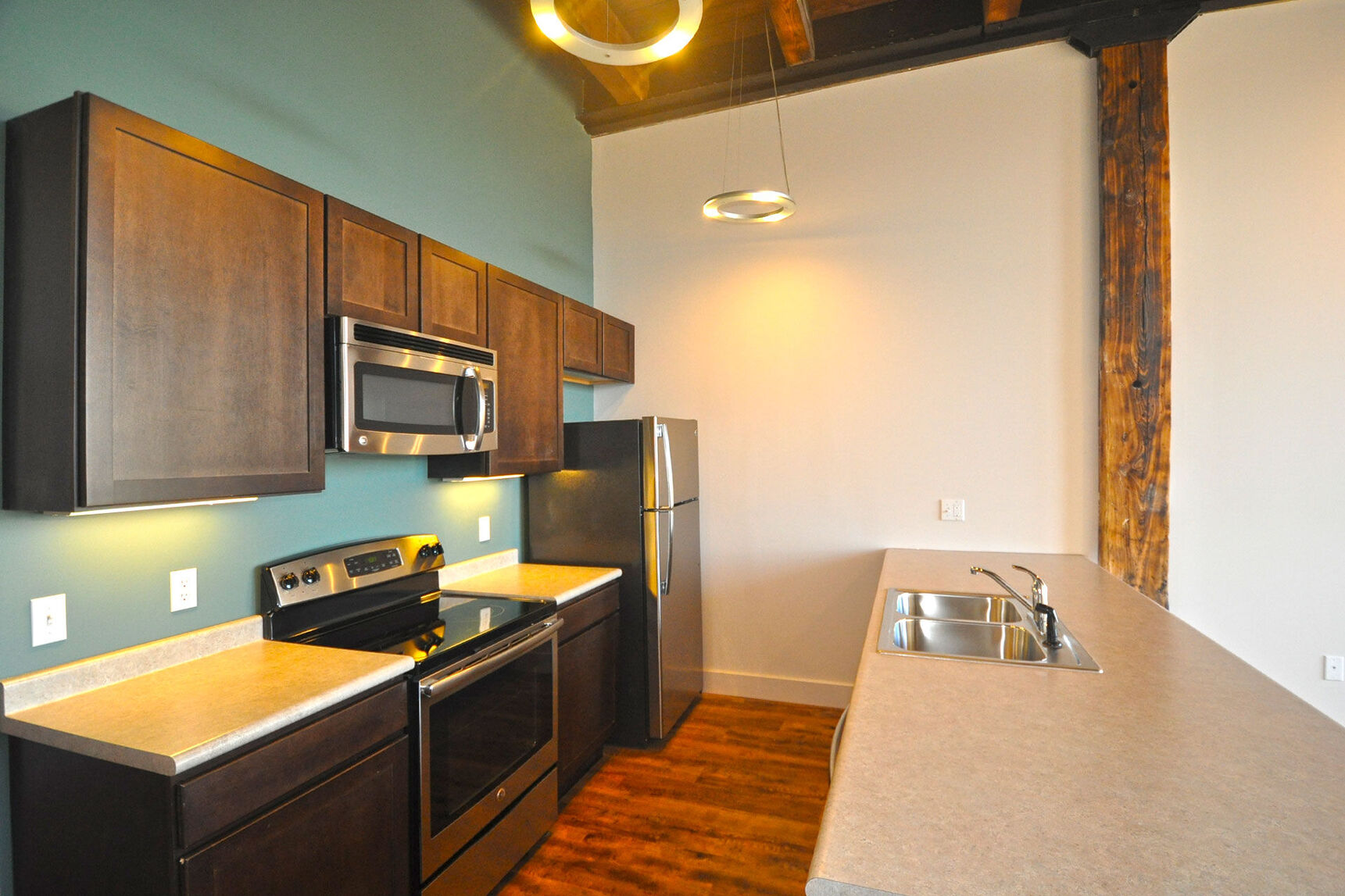 Kitchen with brown cabinets