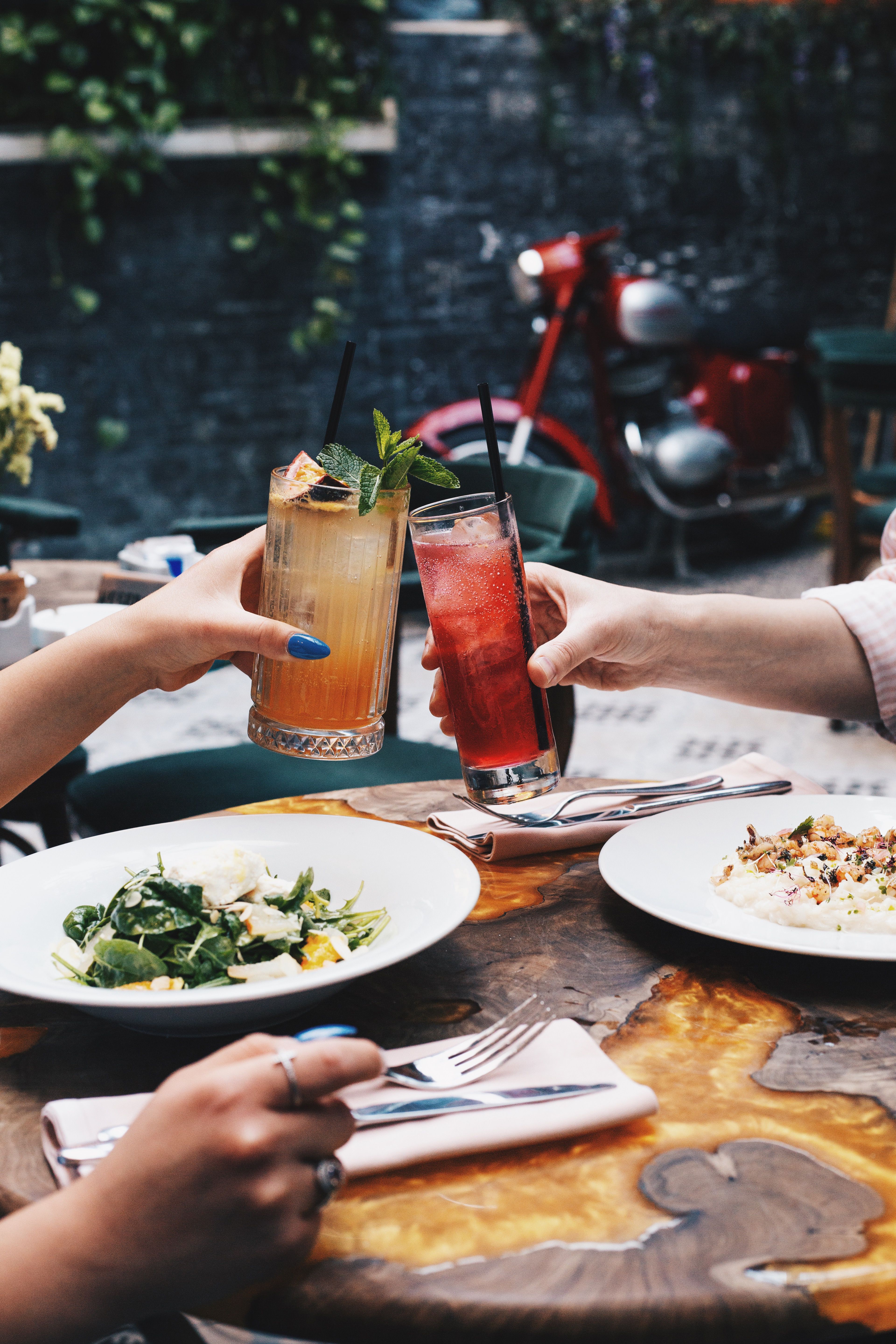 People holding glasses cheersing stock image