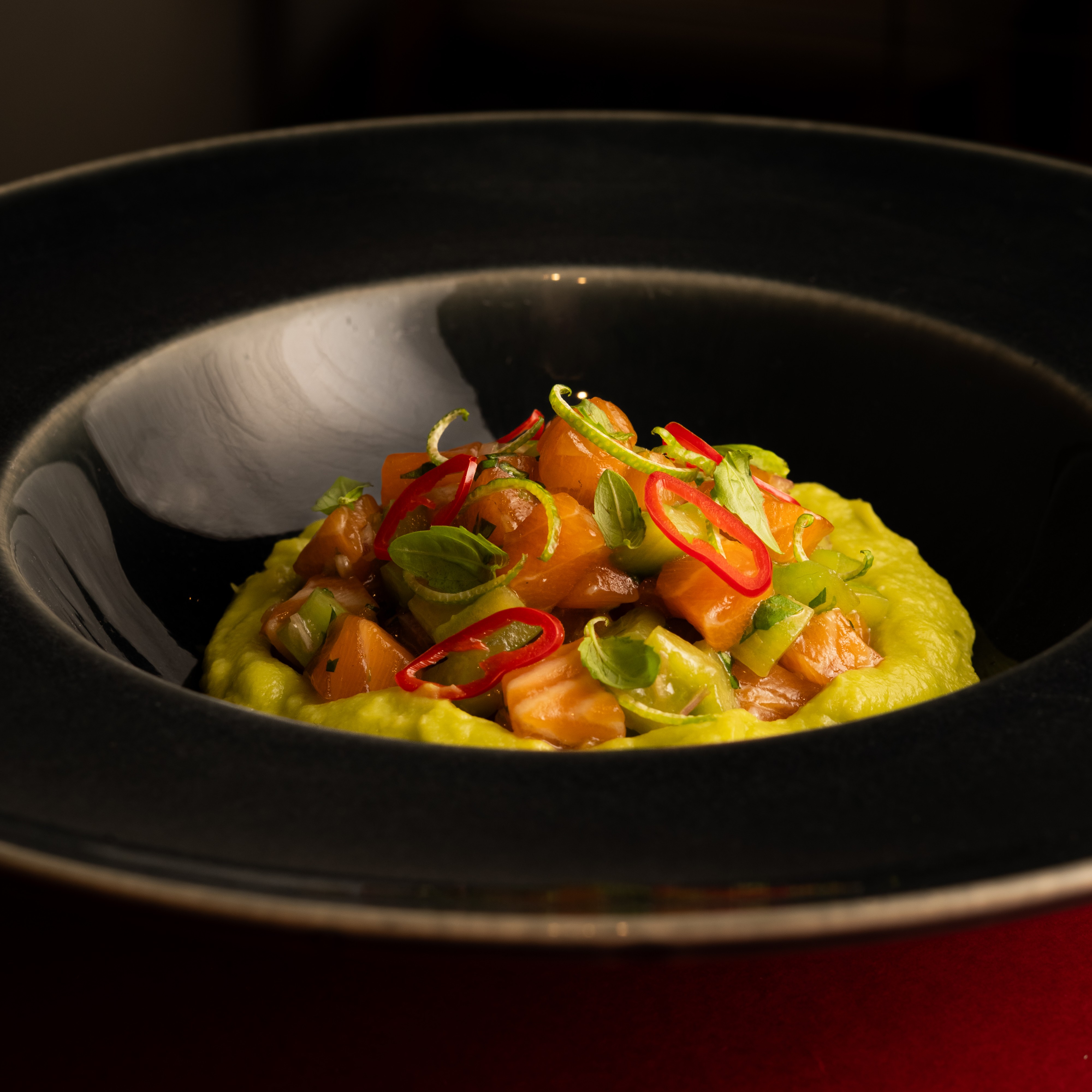 Fresh salmon tartare with avocado and citrus at ANTARES Lounge