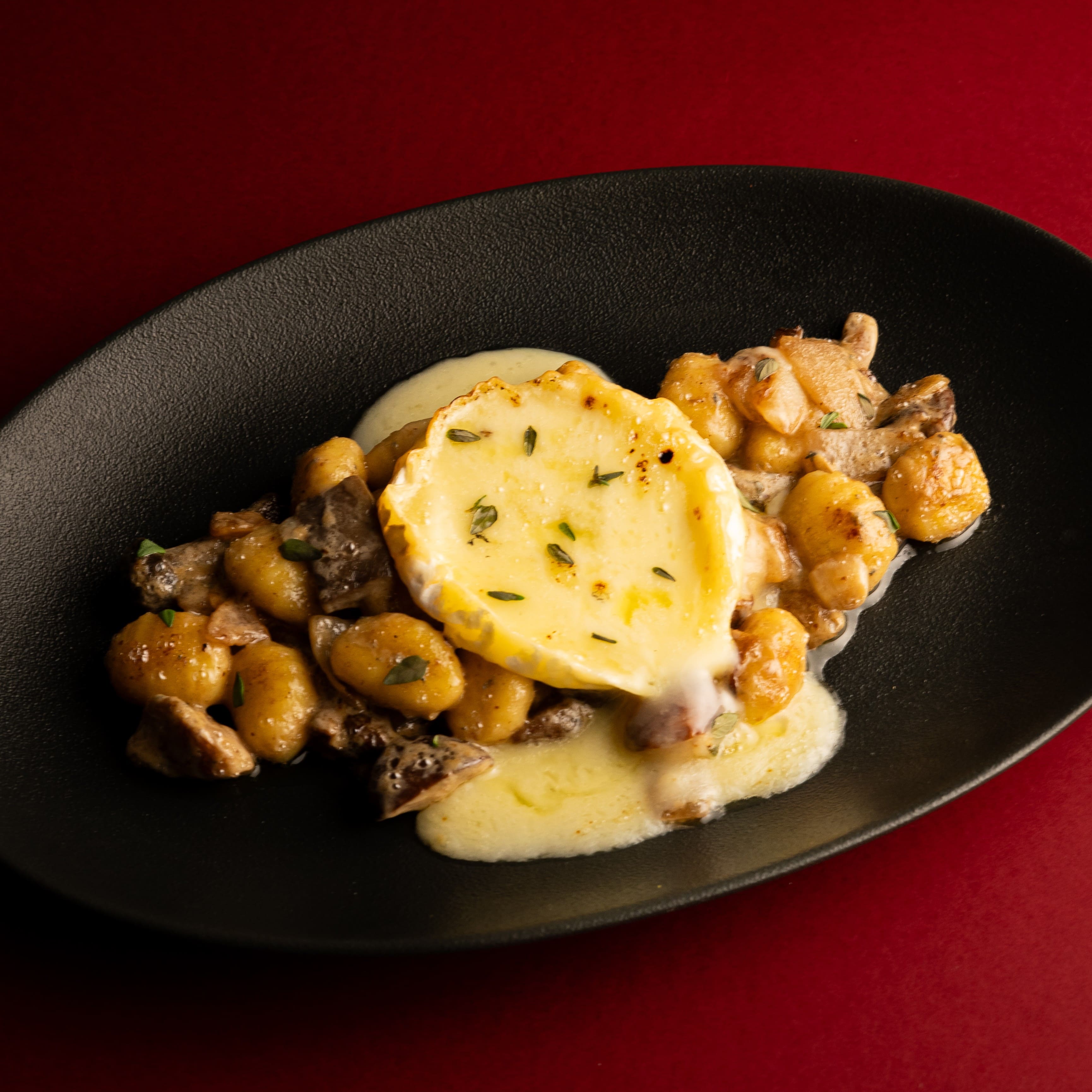 Gnocchi with wild mushrooms, blue cheese and parmesan at ANTARES Lounge