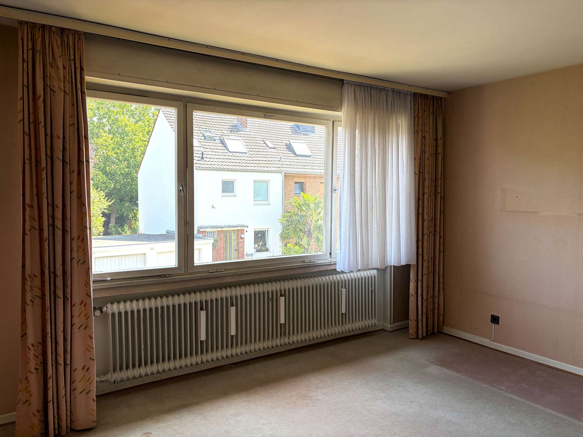 Charmantes Reihenmittelhaus mit sonnigem Garten in Köln-Longerich