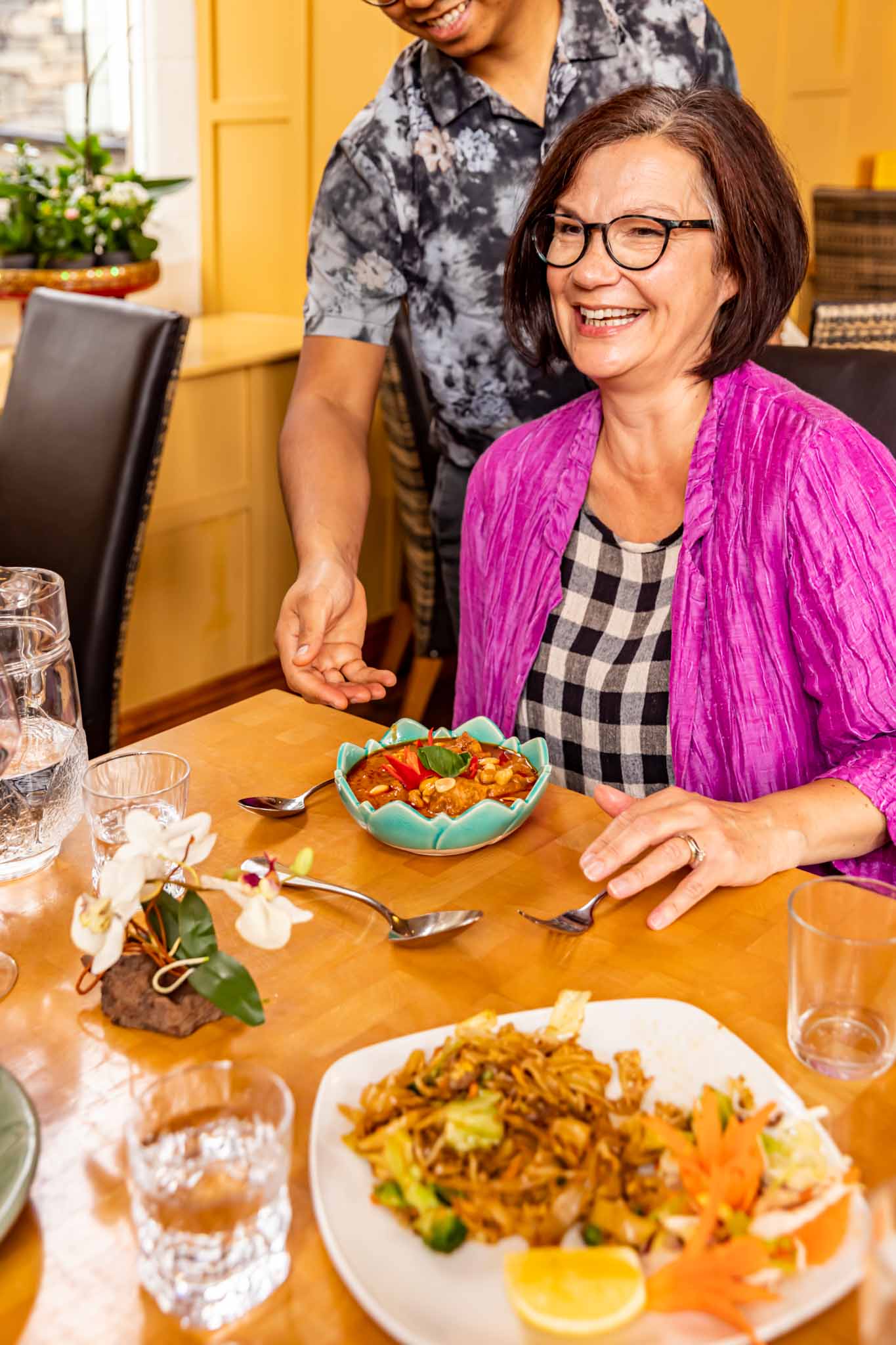 An authentic smile — visitors can tell it isn't staged.