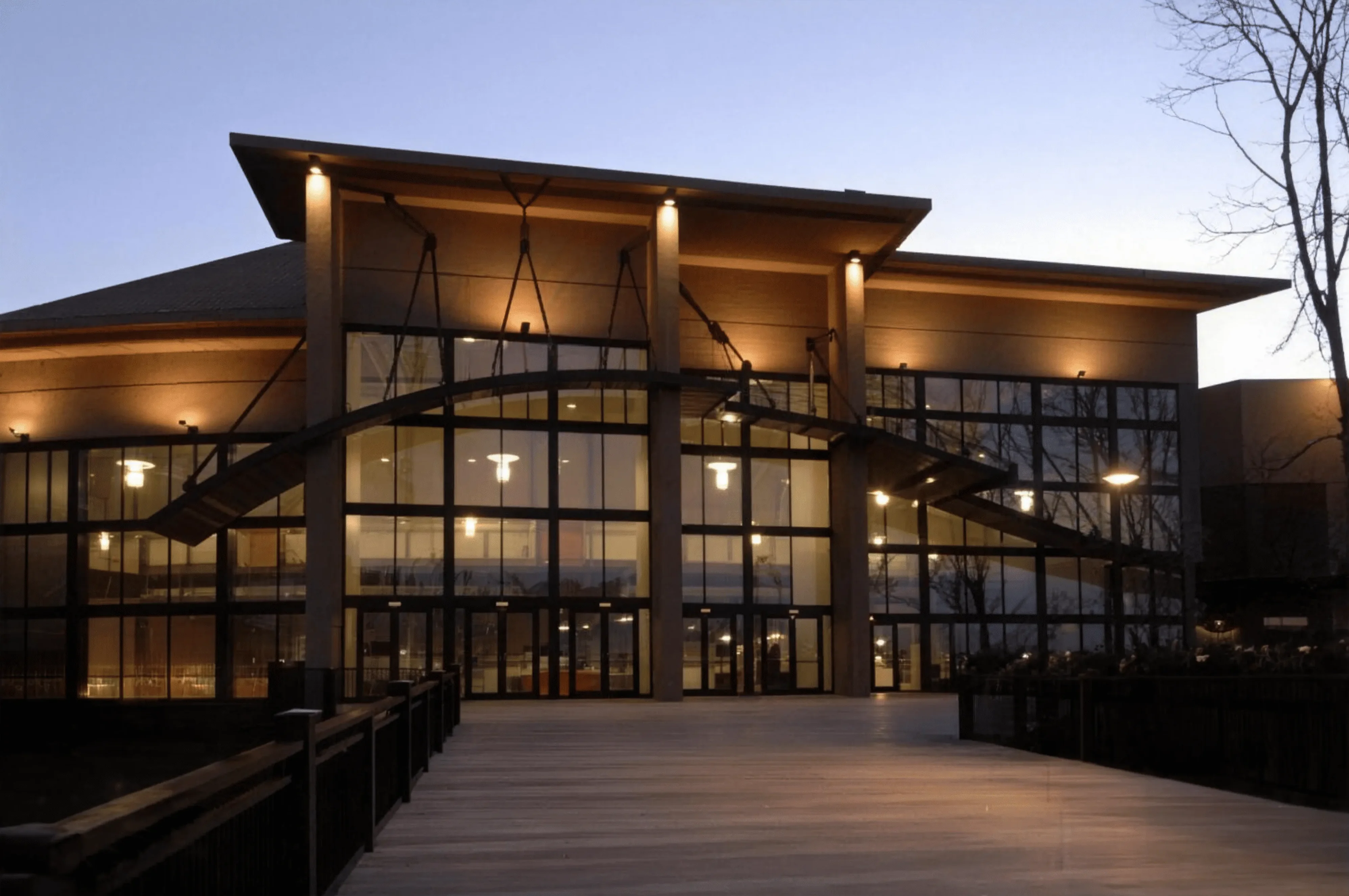12Stone Church glass-fronted entrance lit at dusk