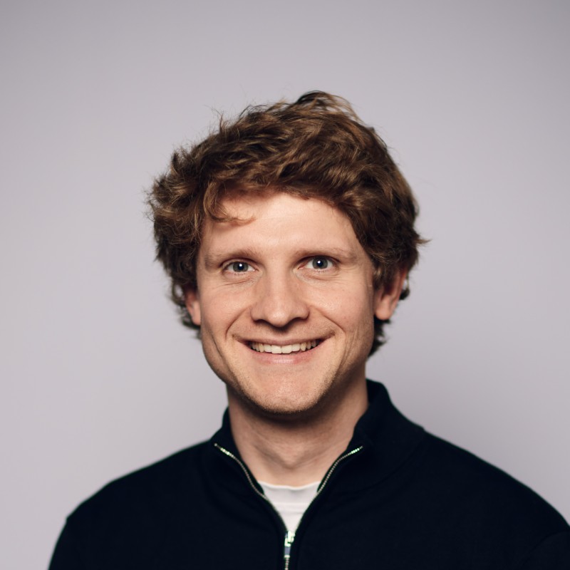 Headshot of Dr. Lukas Wollenschlaeger