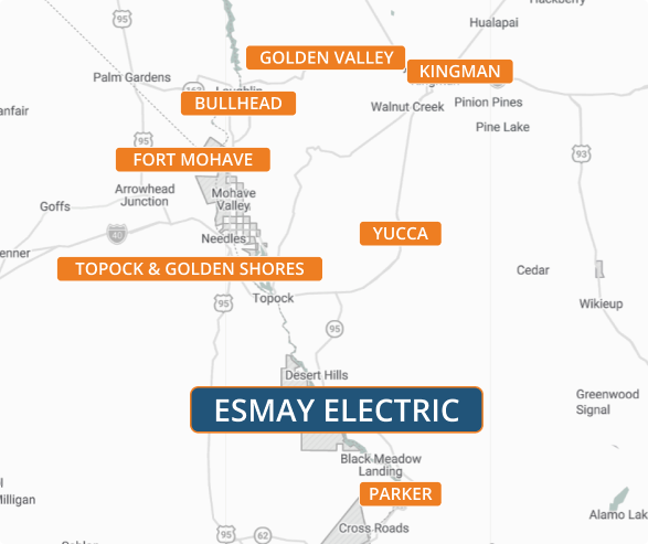 Map of the Esmay Electric service area across Mohave County, including Lake Havasu City, Kingman, Bullhead City, Fort Mohave, Golden Valley, Topock, Golden Shores, Yucca, and Parker