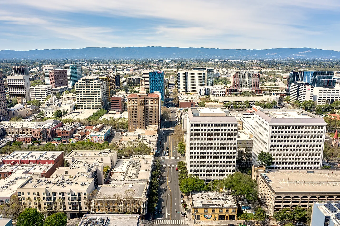 Aerial view of downtown San Jose, California, with the Santa Cruz Mountains beyond