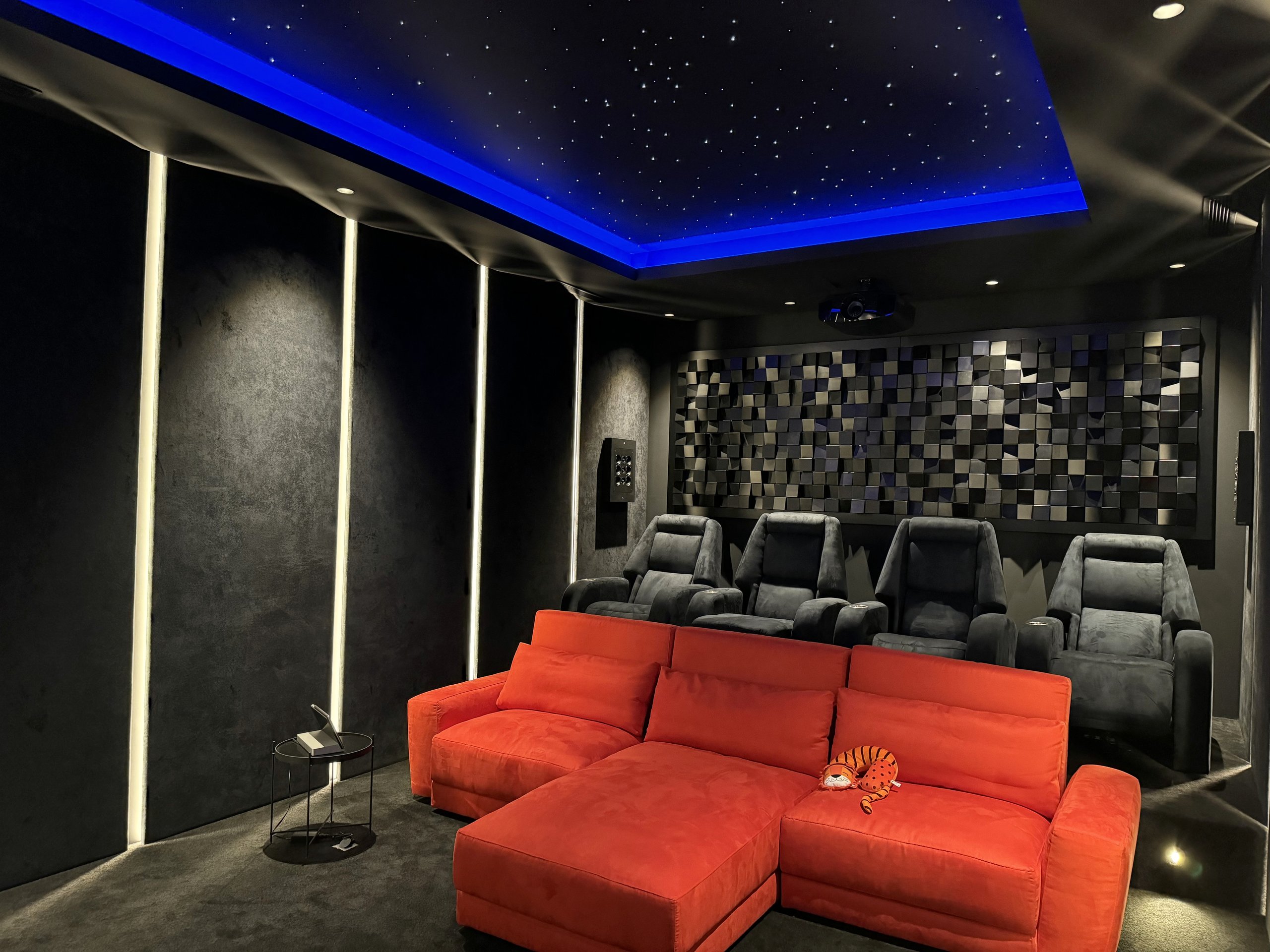 Home cinema with star ceiling and integrated architectural lighting