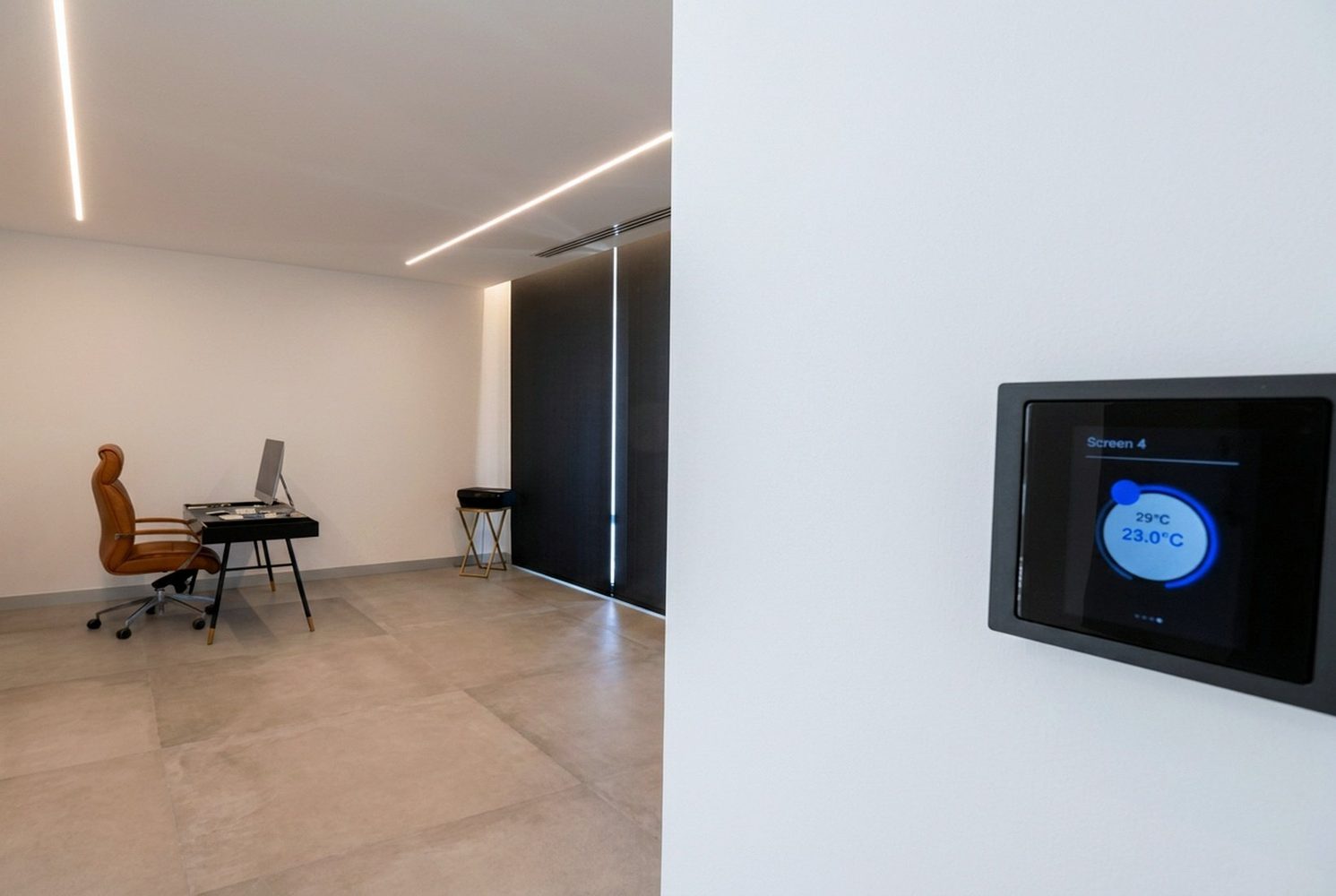 Home office with climate control and automated blackout curtains