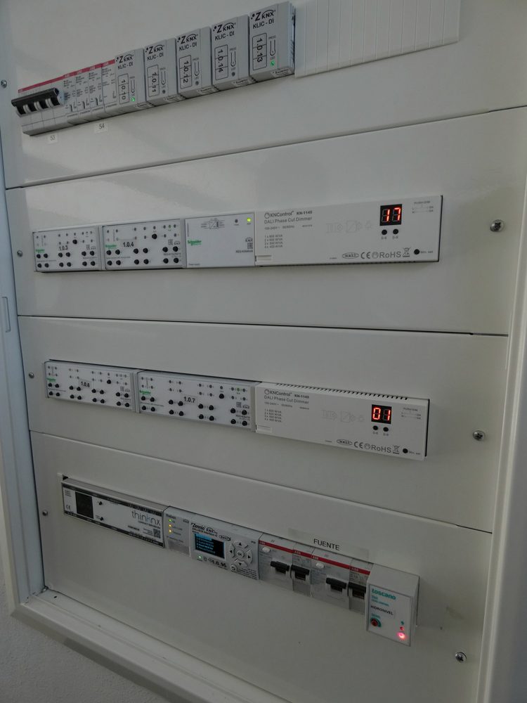 Home automation cabinet with neatly arranged control modules