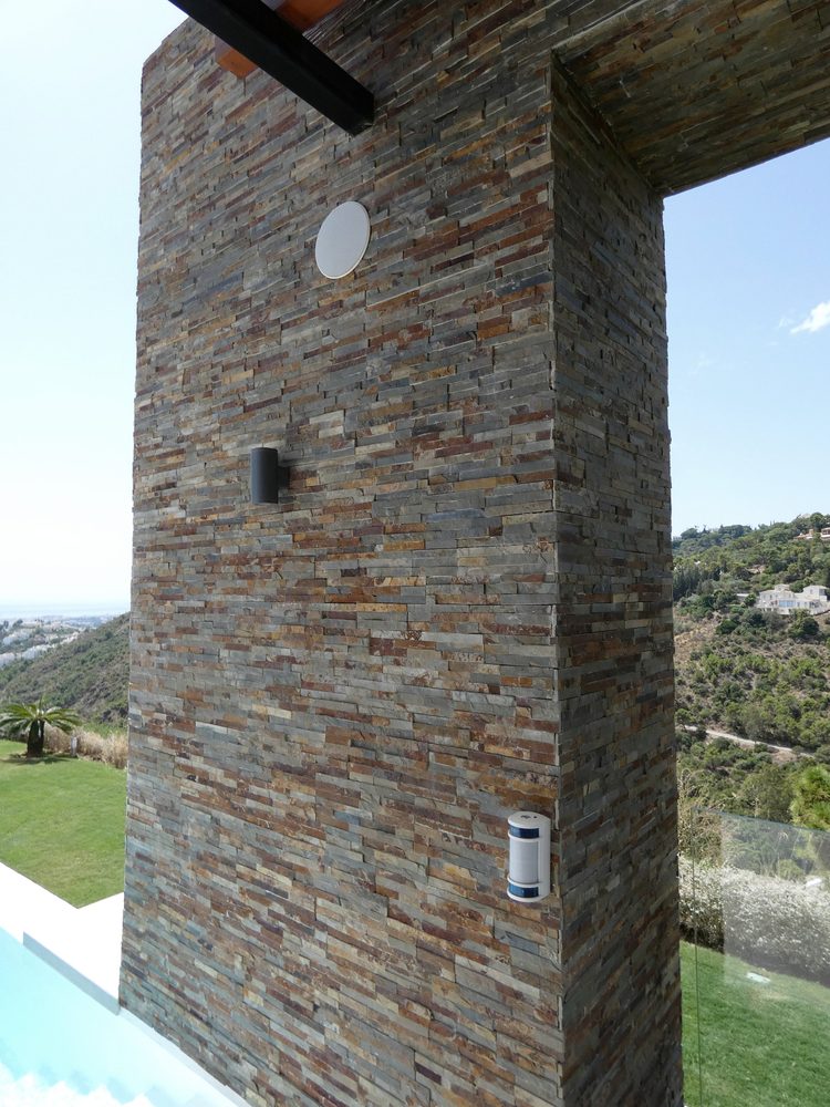 Exterior security sensor integrated into the villa facade