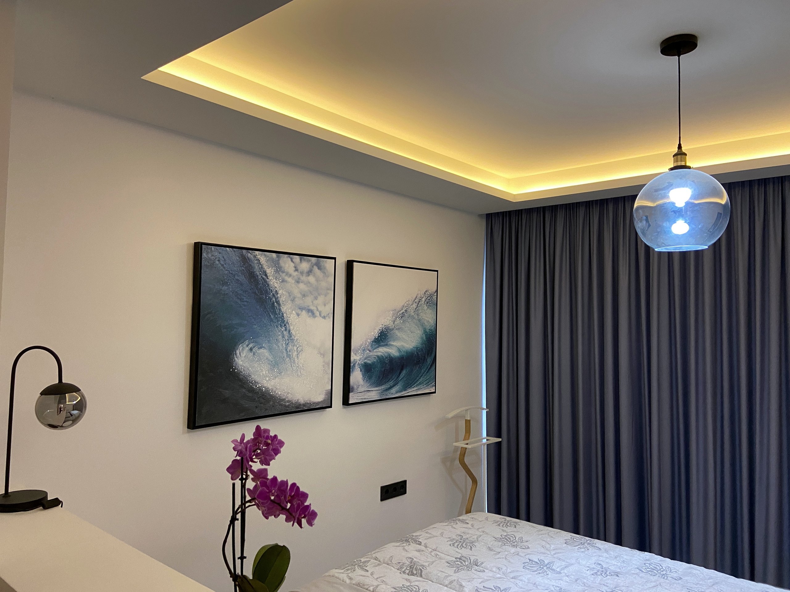 Integrated ceiling lighting in an Estepona townhouse bedroom