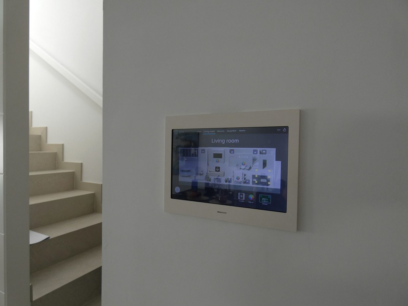 Wall-mounted home control interface in an Estepona townhouse