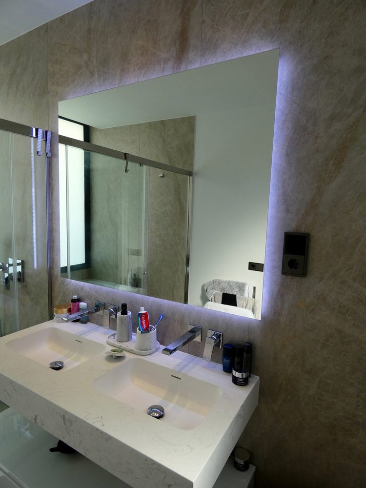 Bathroom mirror lighting and wall-mounted control panel
