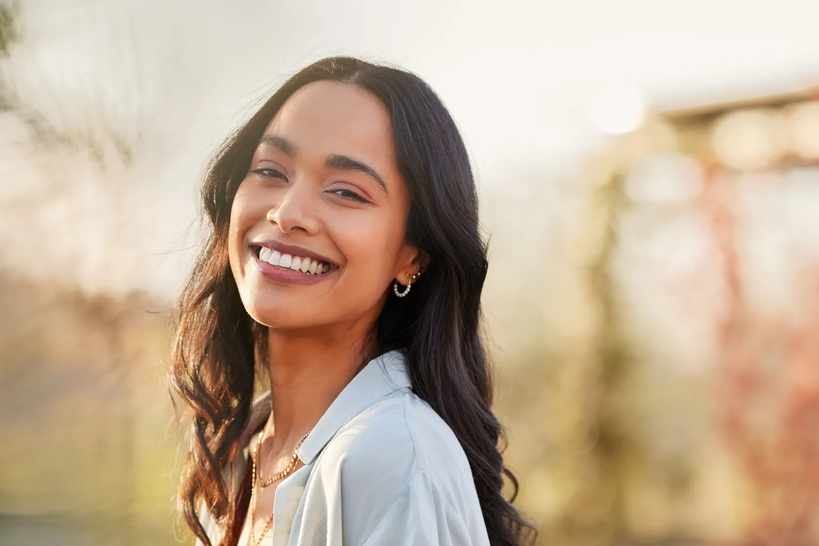 A woman smiling